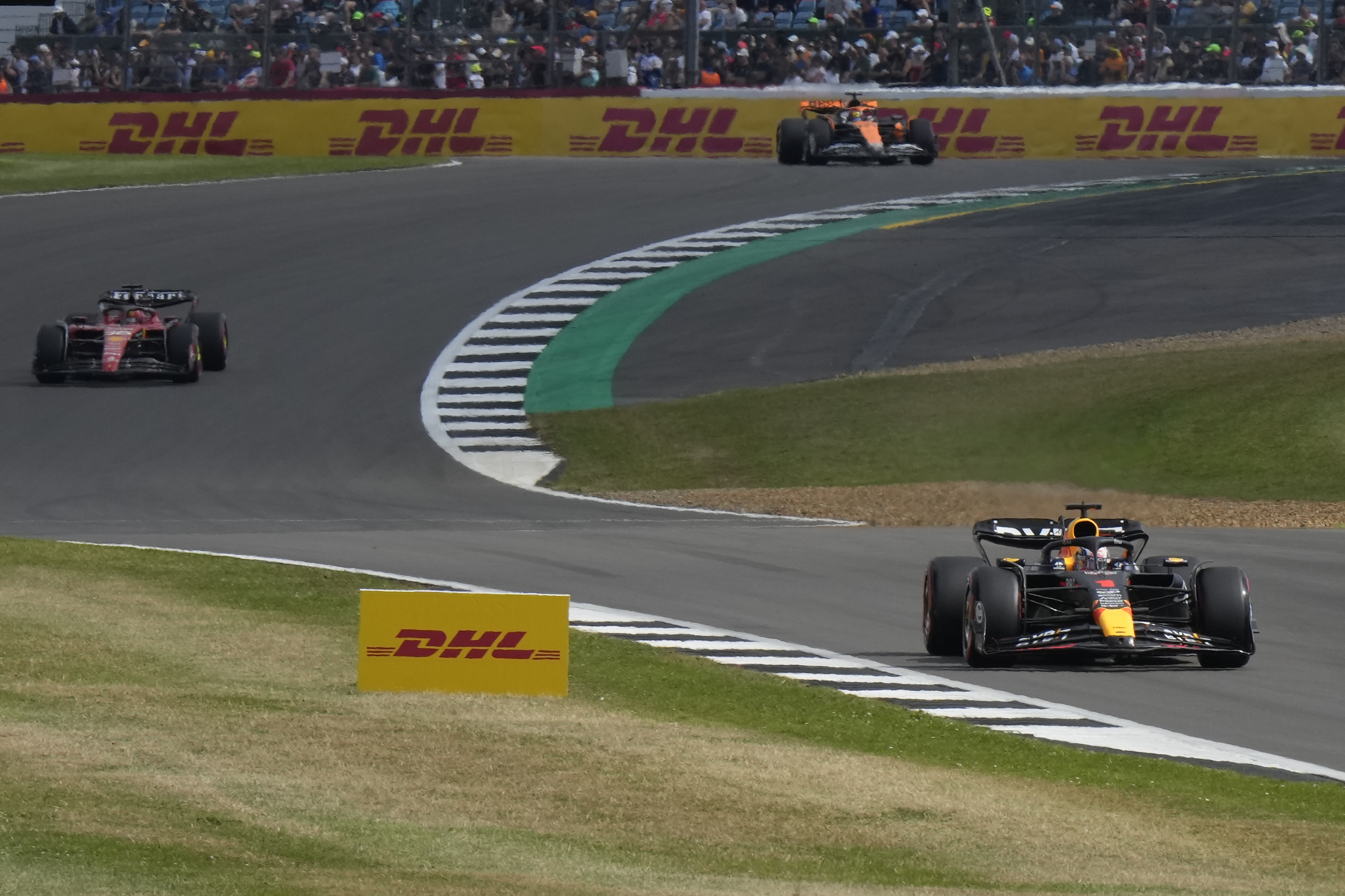 Red Bull driver Max Verstappen of the Netherlands, right, steers his car during the qualifying session at the British Formula One Grand Prix at the Silverstone racetrack, Silverstone, England, Saturday, July 8, 2023. The British Formula One Grand Prix will be held on Sunday. 