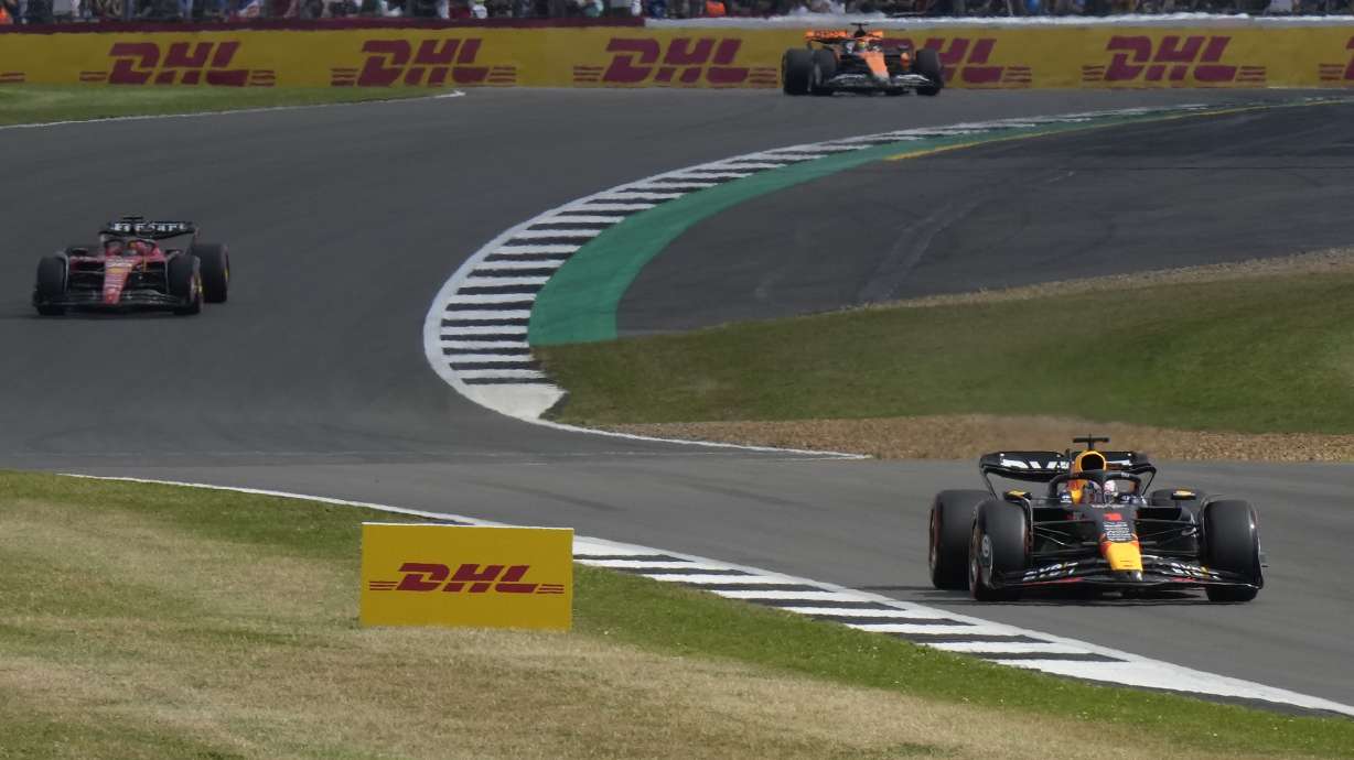 Red Bull driver Max Verstappen of the Netherlands, right, steers his car during the qualifying session at the British Formula One Grand Prix at the Silverstone racetrack, Silverstone, England, Saturday, July 8, 2023. The British Formula One Grand Prix will be held on Sunday.