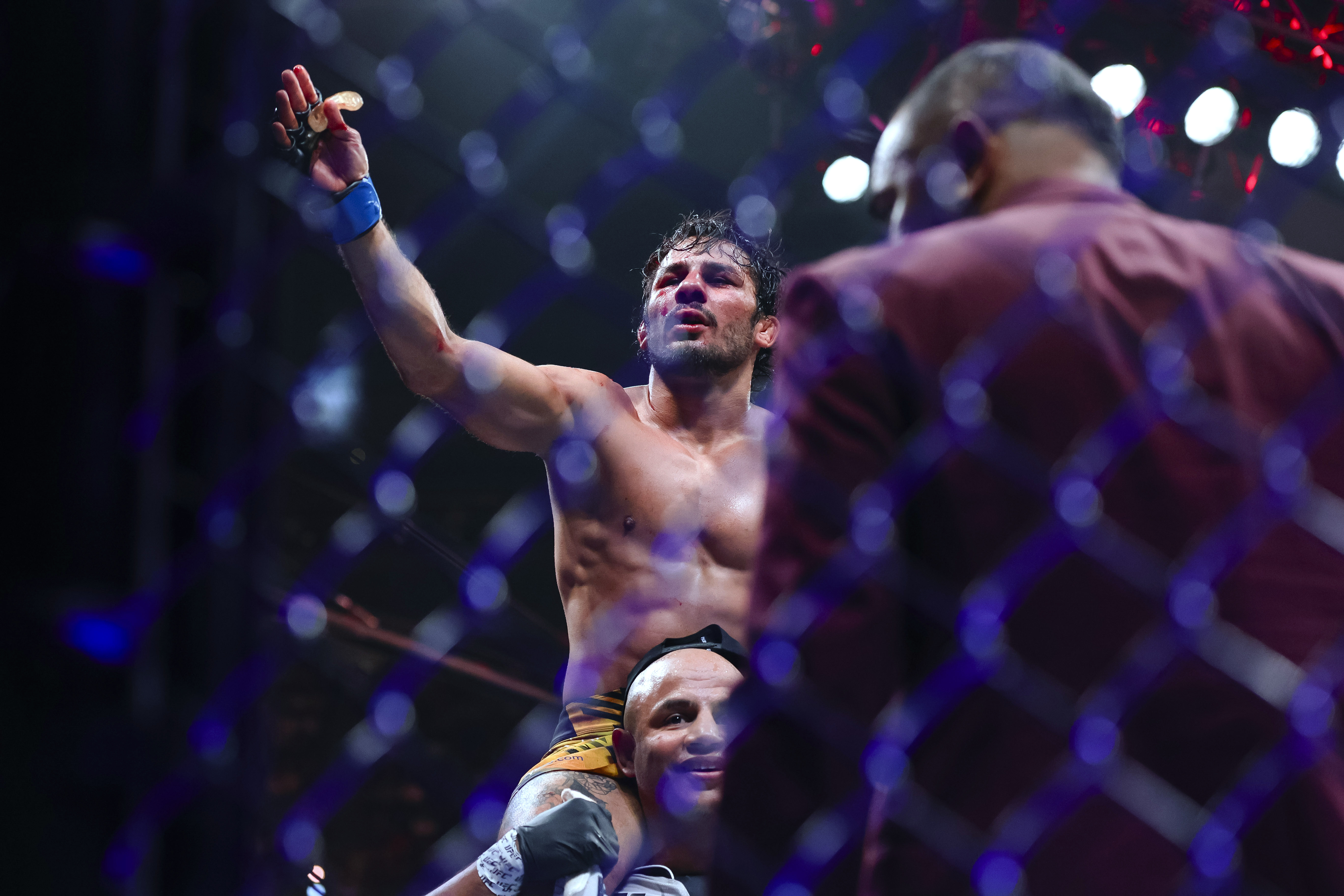 Alexandre Pantoja celebrates after defeating Brandon Moreno during a flyweight mixed martial arts bout during UFC 290 on Saturday, July 8, 2023, in Las Vegas. 