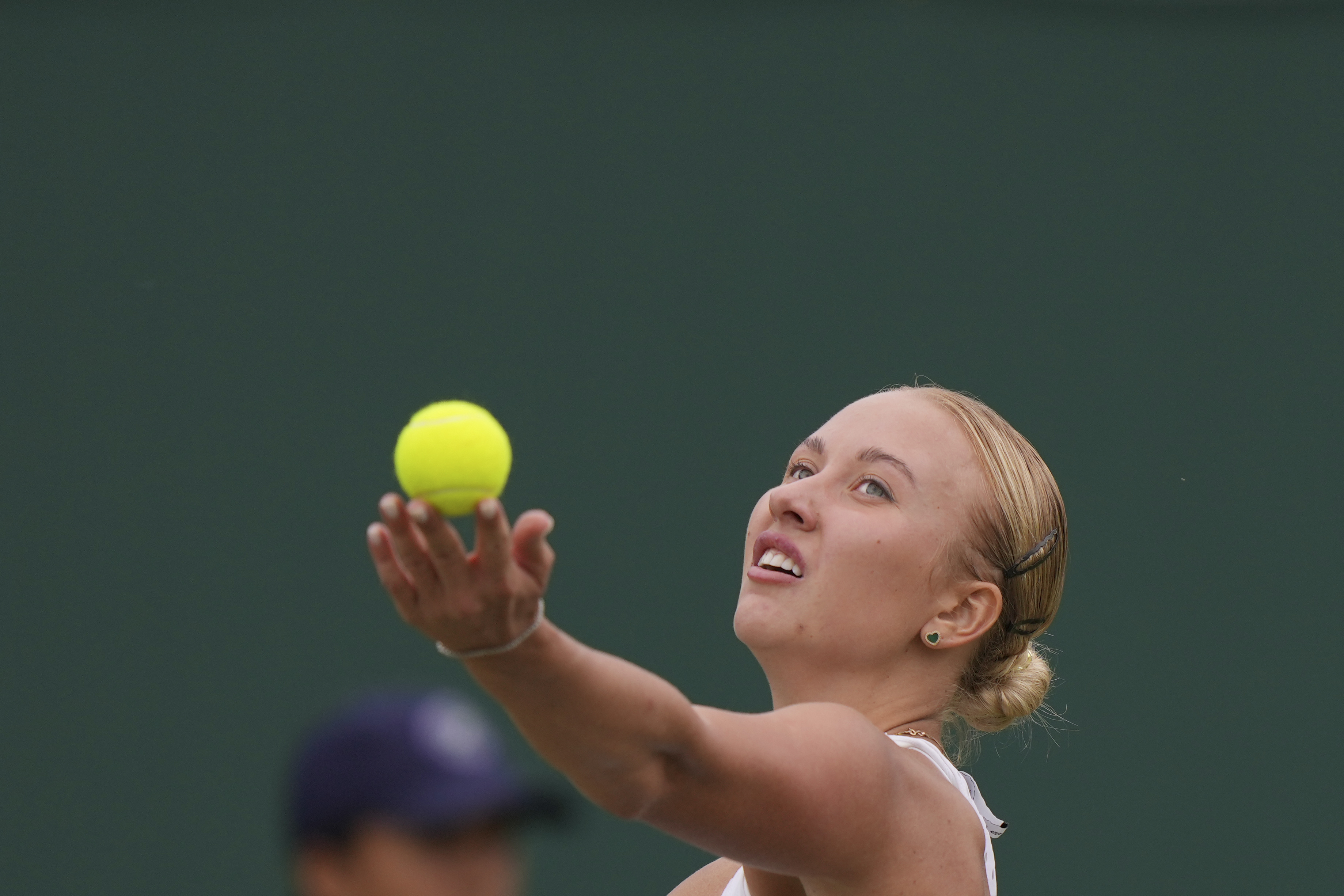 Russia's Anastasia Potapova serves to Russia's Mirra Andreeva during the women's singles match on day seven of the Wimbledon tennis championships in London, Sunday, July 9, 2023. 