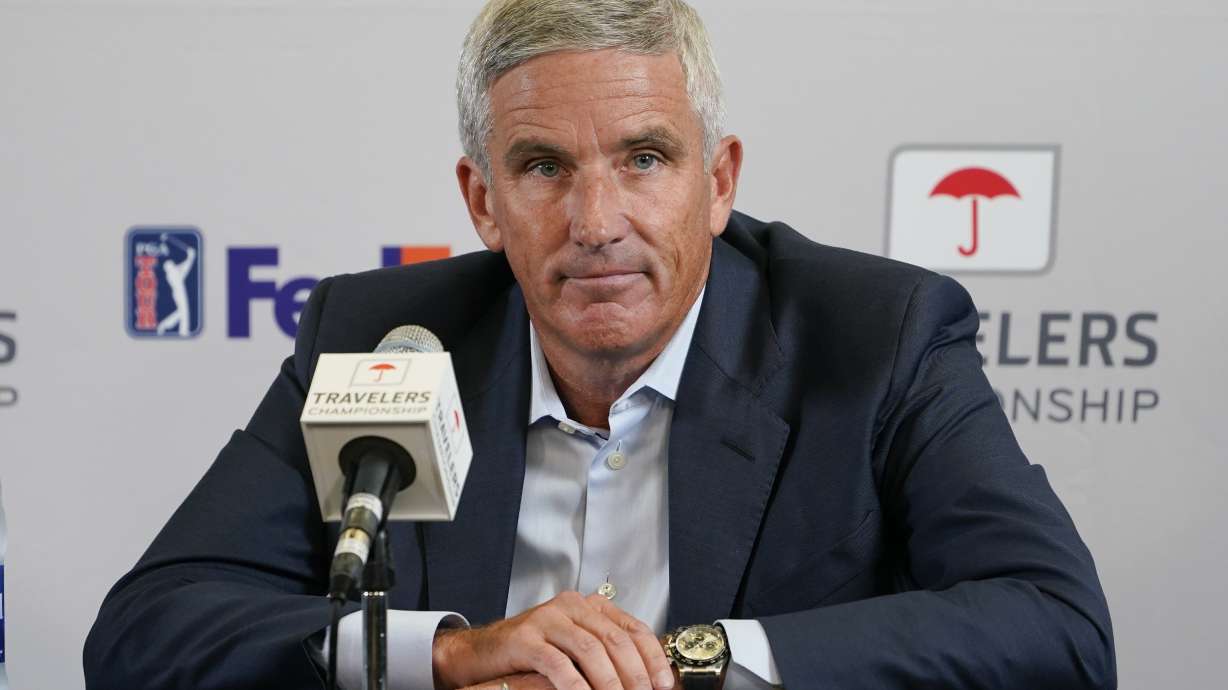 FILE - PGA Tour Commissioner Jay Monahan speaks during a news conference before the Travelers Championship golf tournament at TPC River Highlands, June 22, 2022, in Cromwell, Conn. Monahan is returning to work just over a month after he stepped away for a “medical situation” during a tumultuous time of working out a surprise commercial agreement with the Saudi backers of LIV Golf.