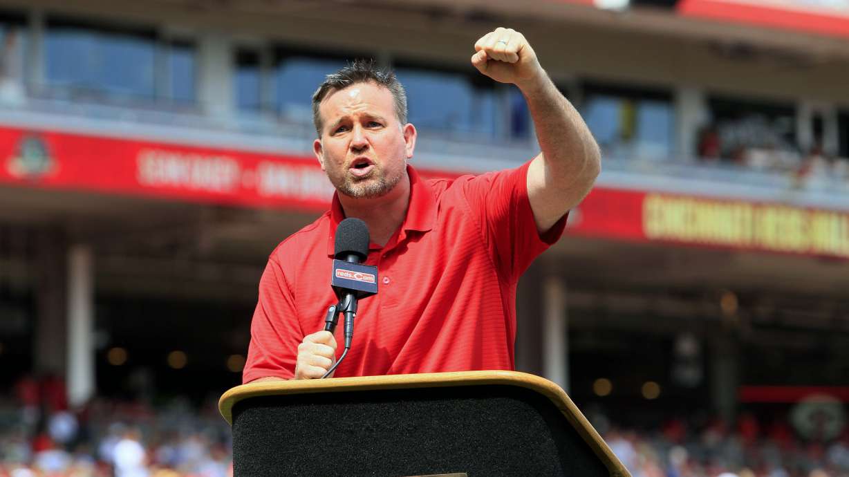 FILE - Former Cincinnati Reds first baseman Sean Casey speaks during ceremonies enshrining him into the team's Hall of Fame prior to a baseball game between the Cincinnati Reds and the Minnesota Twins, Saturday, June 23, 2012, in Cincinnati. The New York Yankees have hired 12-year big league veteran Sean Casey as their hitting coach for the remainder of this season, a person with knowledge of the situation told The Associated Press. The person spoke to the AP on condition of anonymity because the deal has not been formally announced. Casey, 49, has been working for MLB Network as an analyst.