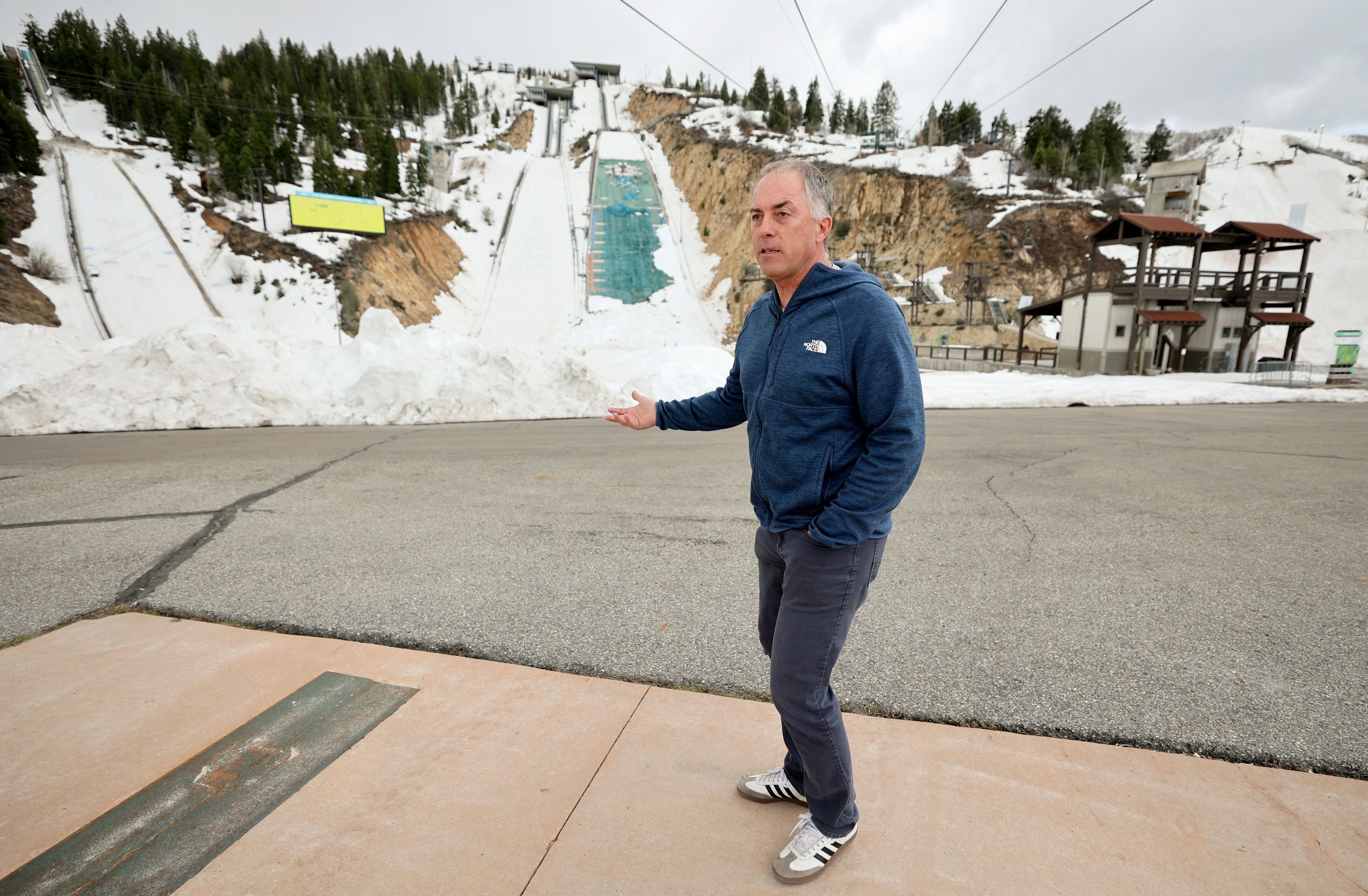 Colin Hilton, Olympic Legacy Foundation president, shows the ski jump runs at the Utah Olympic Park in Park City on May 4.