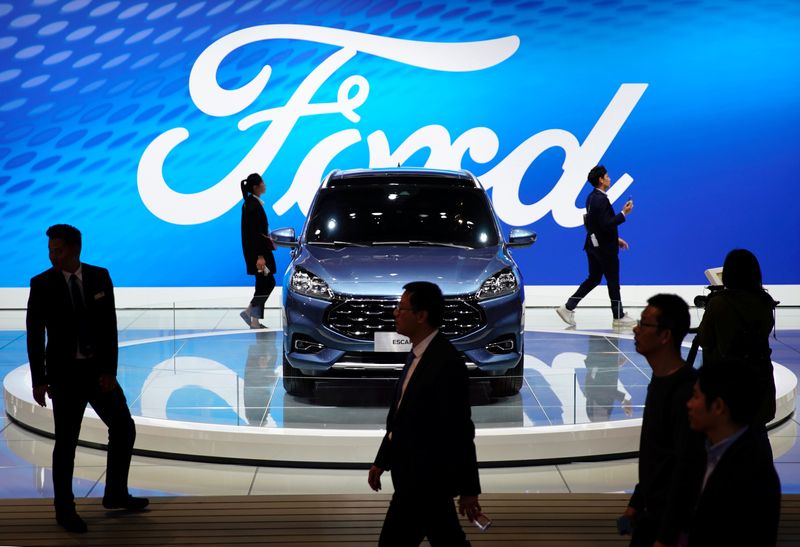 U.S. auto safety investigators said Tuesday they are opening an investigation into 346,000 Ford Escape sport utility vehicles because a weld in the door assembly may fail.