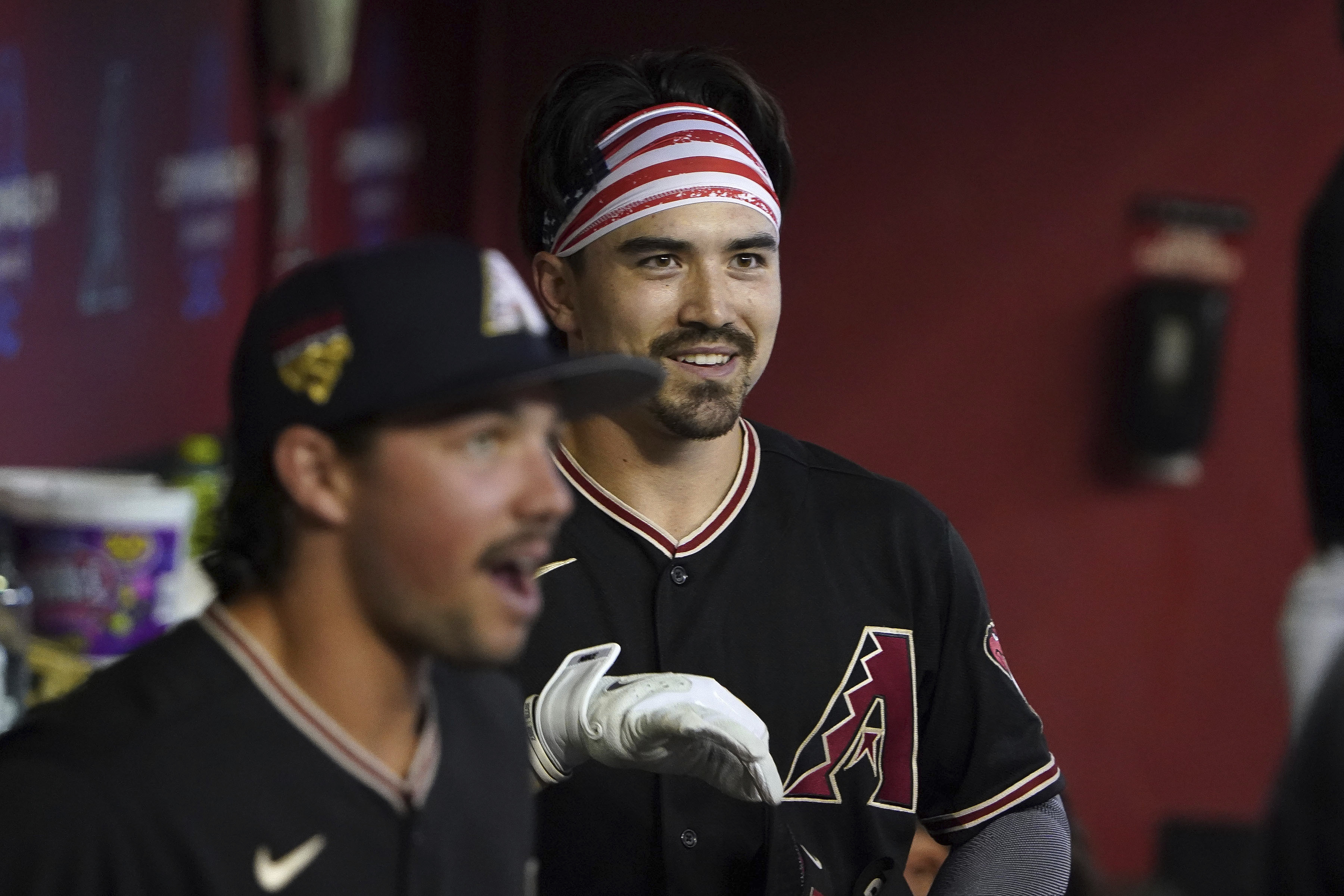 Arizona Diamondbacks' Corbin Carroll smiles after his home run against the New York Mets during the first inning of a baseball game Tuesday, July 4, 2023, in Phoenix. 
