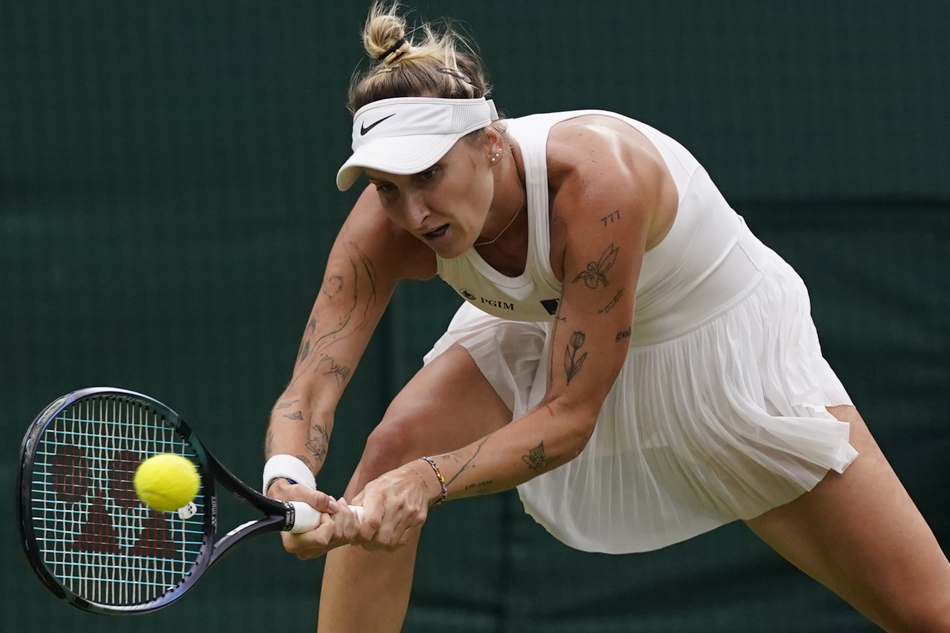 Czech Republic's Marketa Vondrousova in action against Jessica Pegula of the US during their women's singles match on day nine of the Wimbledon tennis championships in London, Tuesday, July 11, 2023. 