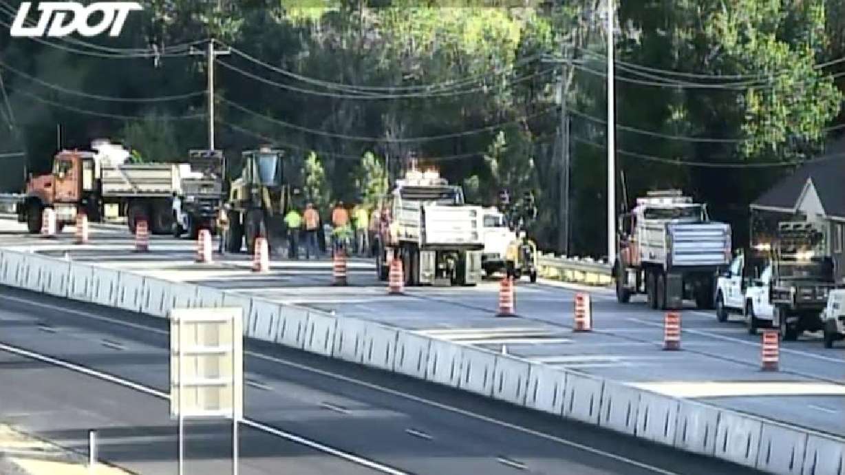 Utah Department of Transportation crews repair damage to U.S. 89 in Layton after a section of the highway buckled late Monday afternoon. The impacted highway lane has since reopened.