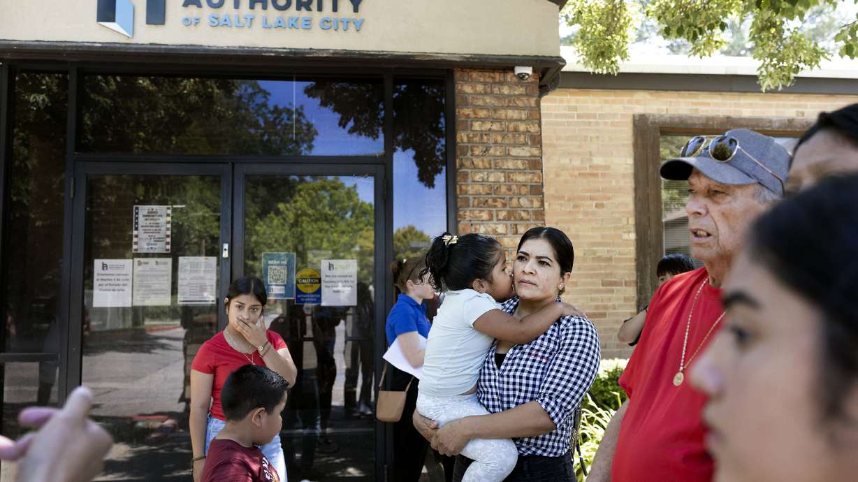 Tenants of Housing Assistance Management Enterprise apartments after delivering a collective letter to its president demanding an end to the rent increase at the office of the Housing Authority of Salt Lake City on June 30.