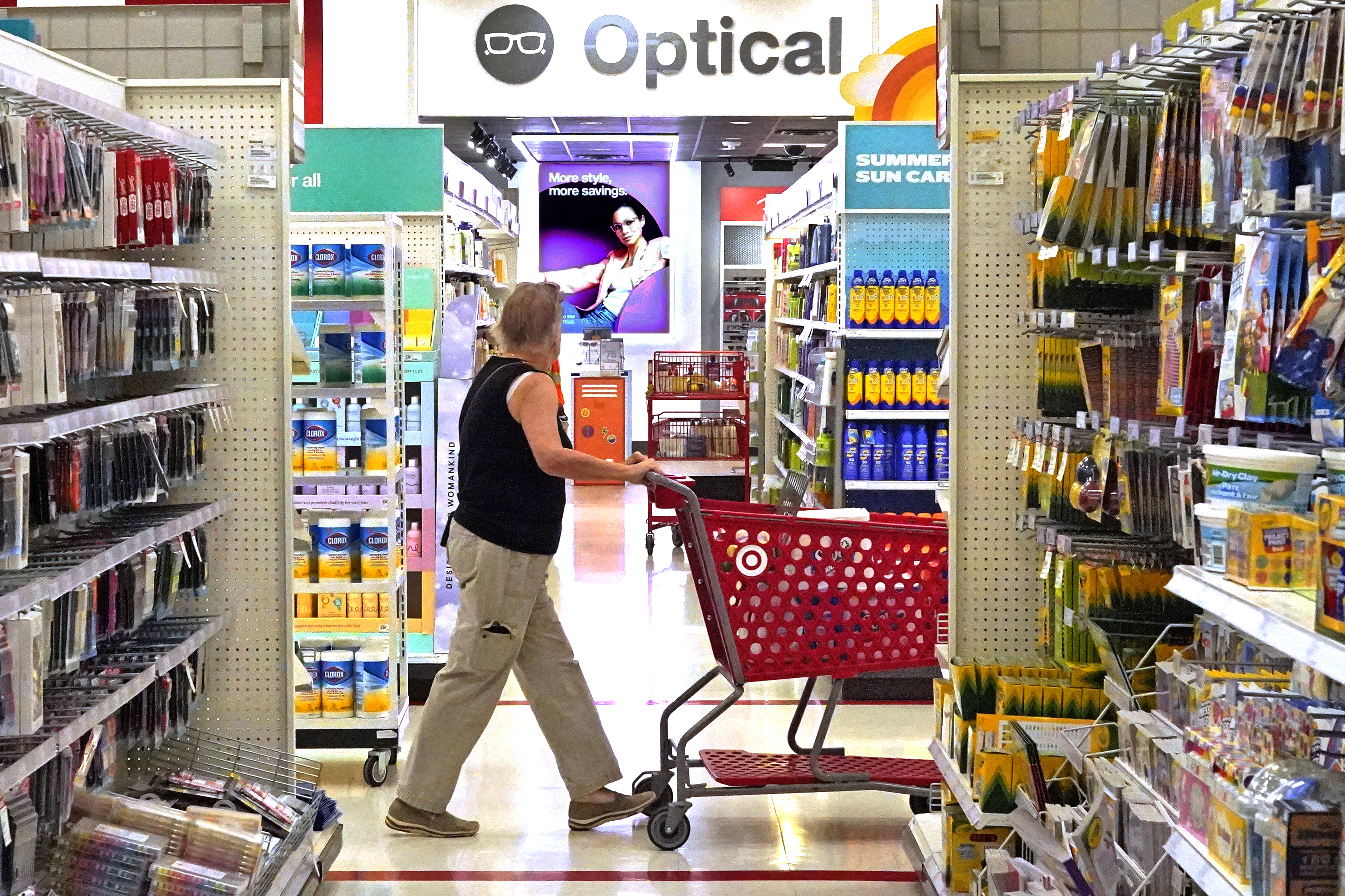 A shopper looks down an aisle in a Target store in Upper Saint Clair, Pa., on July 7. On Wednesday, the Labor Department said U.S. inflation fell to 3% in June.