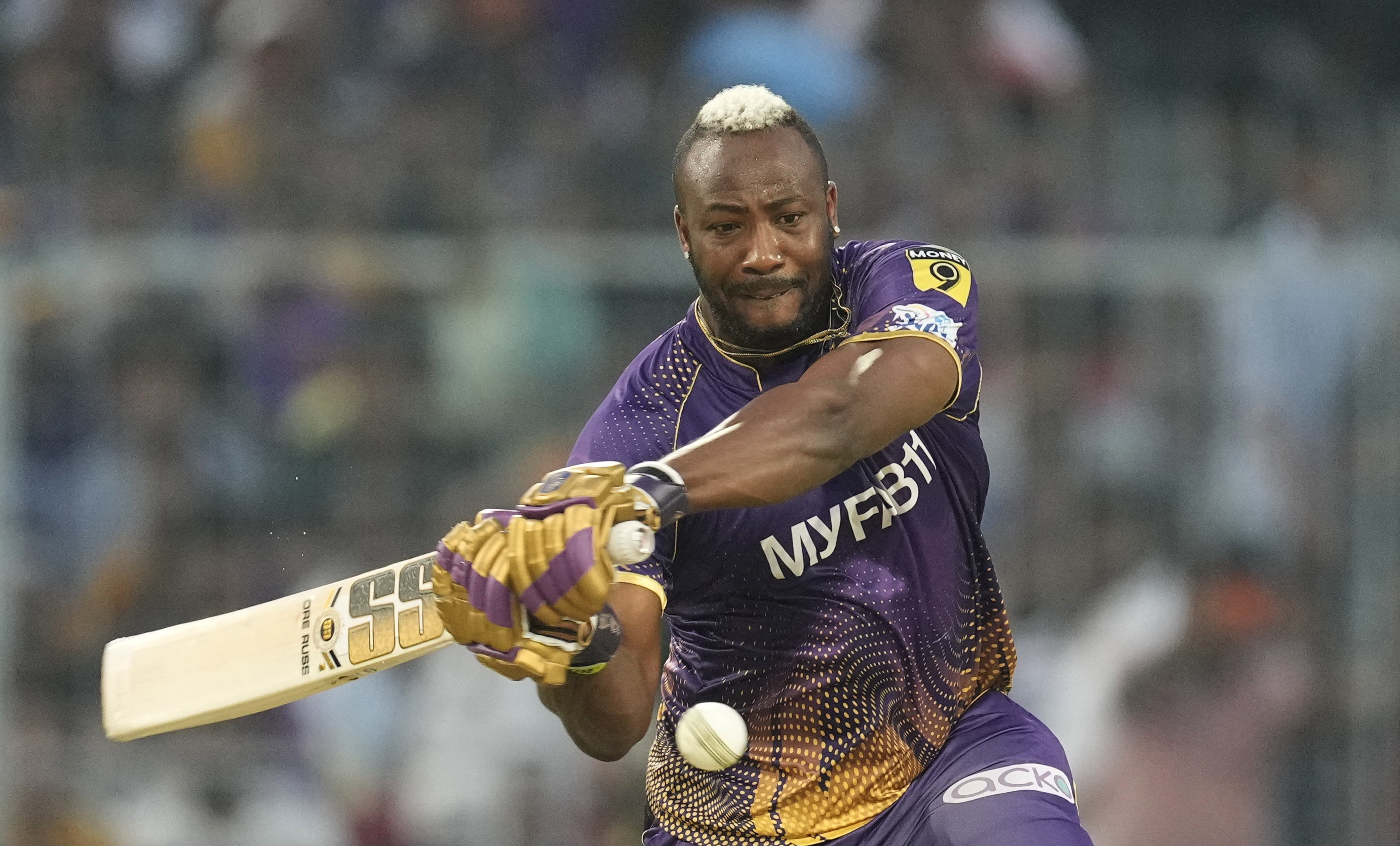 FILE - Kolkata Knight Riders' Andre Russell plays a shot during Indian Premier League cricket match between Kolkata Knight Riders and Gujarat Titans, in Kolkata, India, Saturday, April 29, 2023. George Bernard Shaw asserted “the English are not very spiritual people so they invented cricket to give them some idea of eternity.” That might explain why cricket has flourished to such an extent in Britain and some of its former colonies but never to the same degree in the United States. 