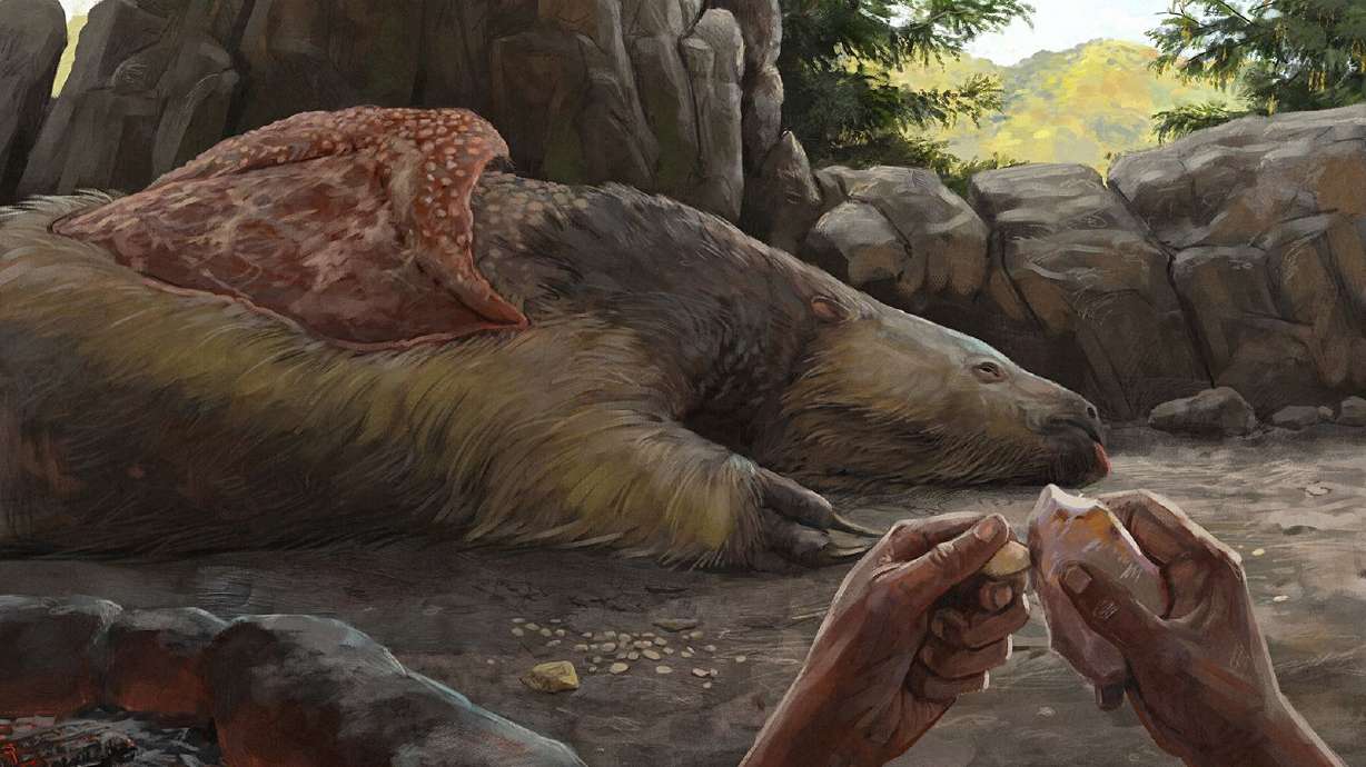 An artist's impression of the Santa Elina rock shelter shows a giant sloth. An unprecedented discovery made by archaeologists working in Brazil is shaking up what we know about the first inhabitants of the Americas.