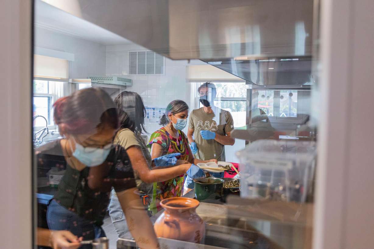 Individuals participate in an Artes de Mexico en Utah workshop about sustainable ancestral farming practices as part of Latino Conservation Week.