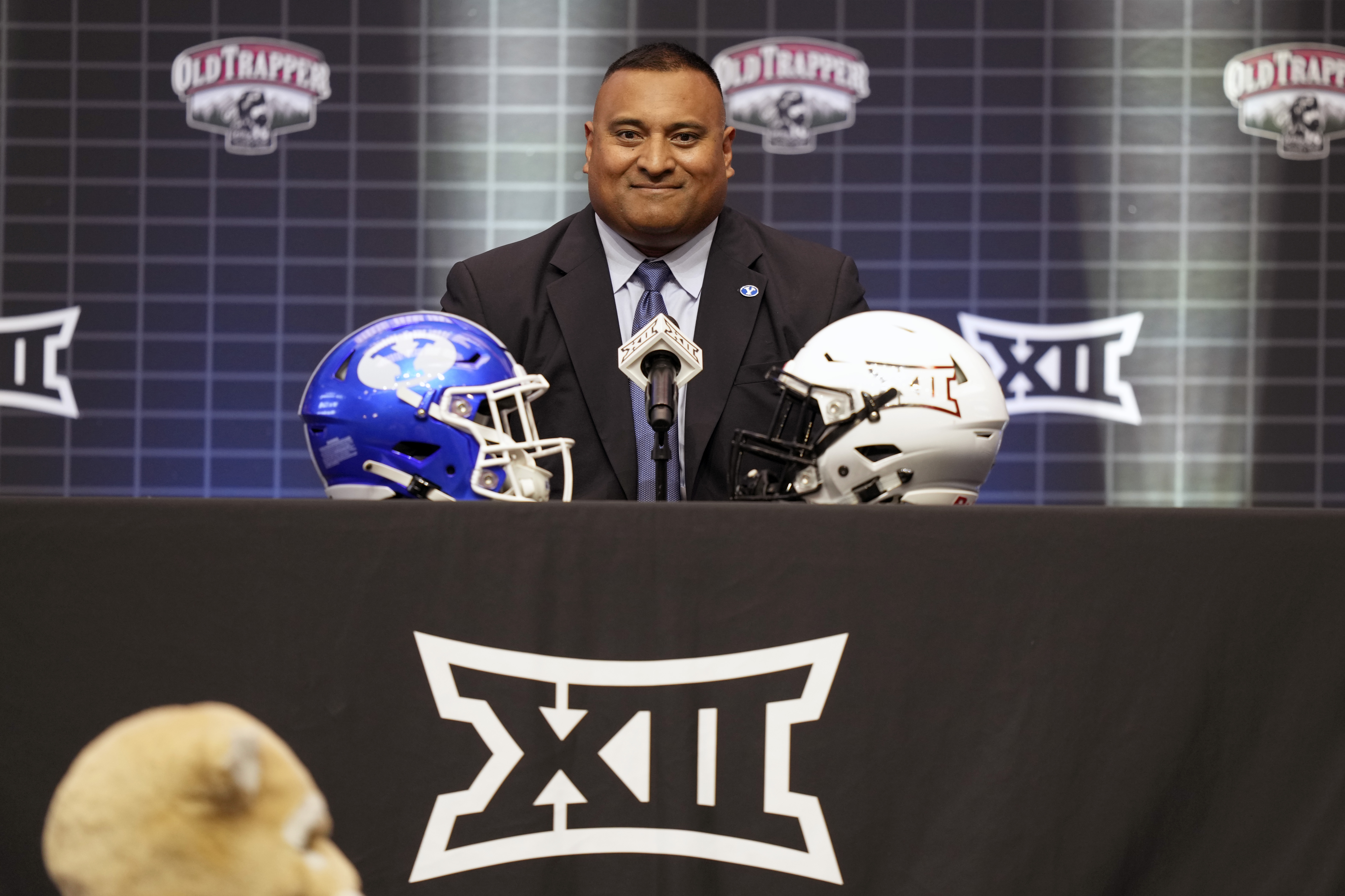 BYU coach Kalani Sitake smiles before speaking during the Big 12 college football media days in Arlington, Texas, Wednesday, July 12, 2023.