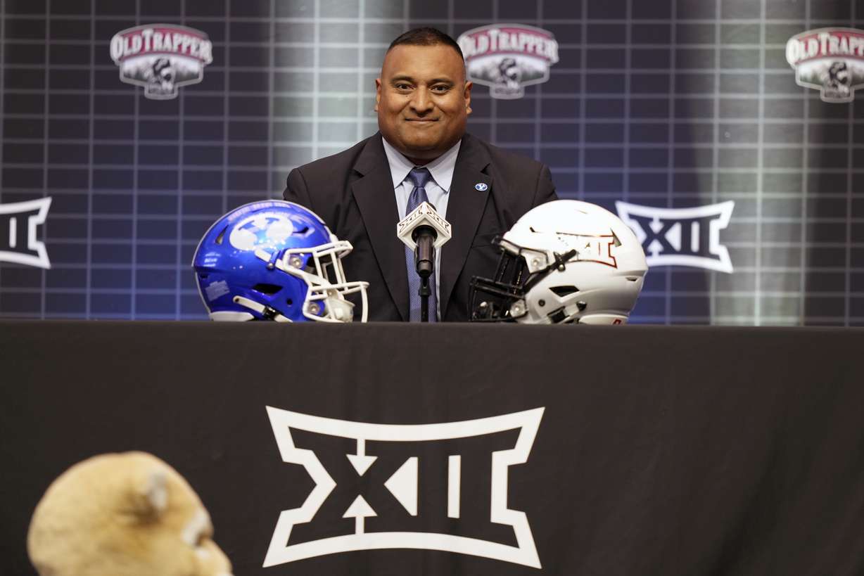 BYU coach Kalani Sitake smiles before speaking during the Big 12 college football media days in Arlington, Texas, Wednesday, July 12, 2023.