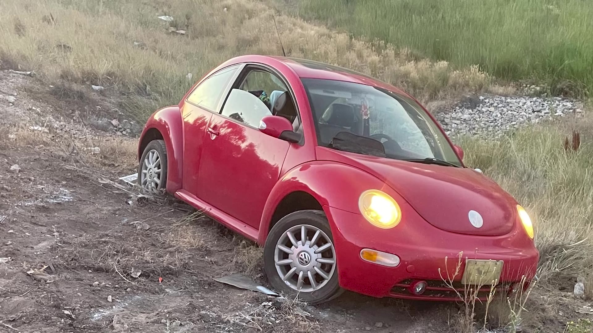 A woman was trapped under this car after a roadside mishap in Spanish Fork on Tuesday.