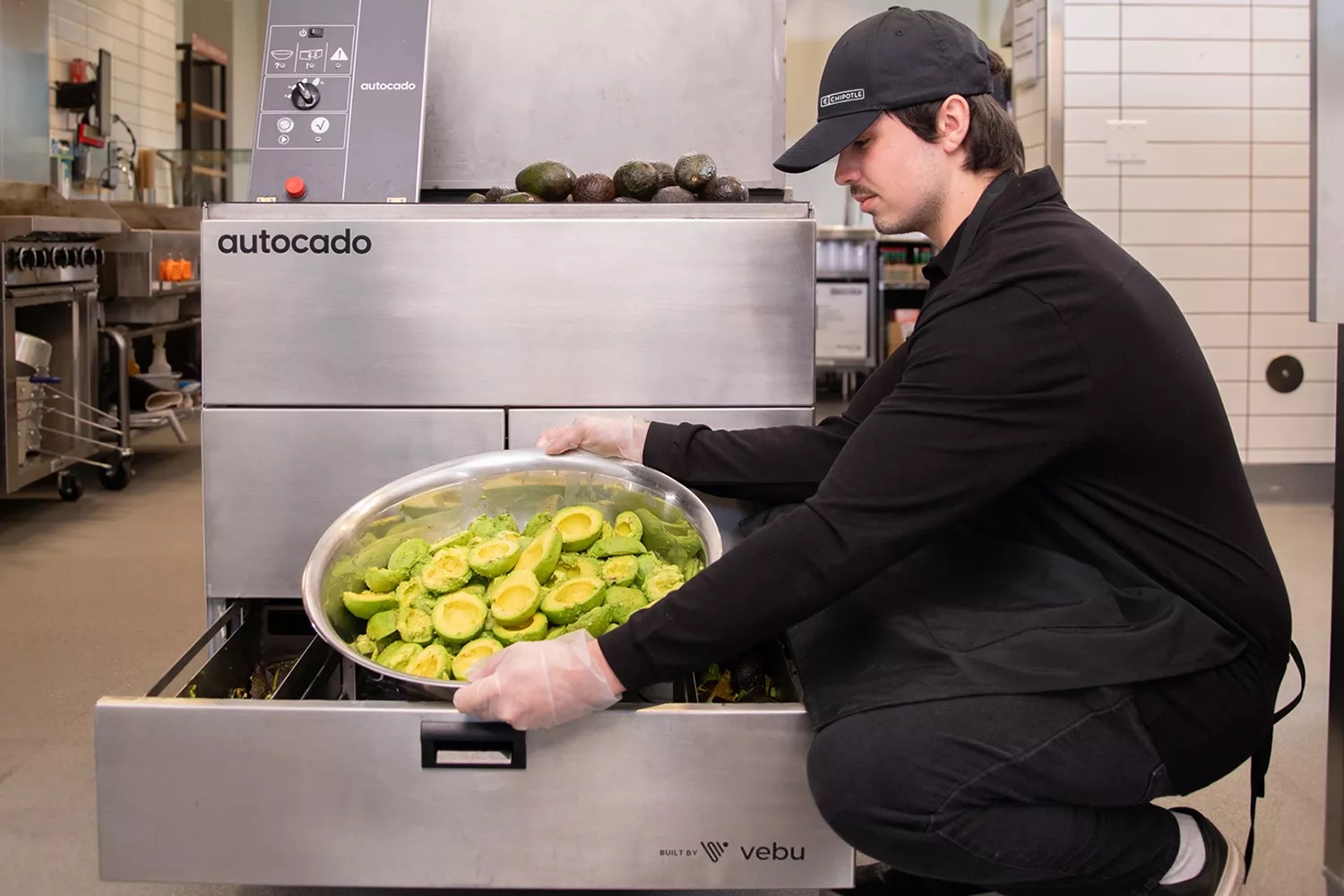 Chipotle is adding a robot to speed production in the kitchen without jeopardizing jobs, the company says. 