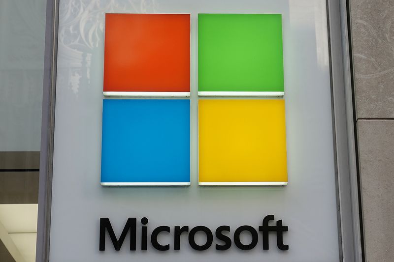 A Microsoft logo is pictured on a store in the Manhattan borough of New York City, January 25, 2021. Microsoft this week blamed hackers for stealing emails from senior U.S. officials, including State Department employees. 
