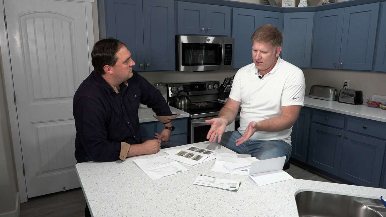 Eric Prettyman shows Matt Gephardt the letter he received from a car rental company saying he was responsible for over $1,400 in damage he says he did not cause.