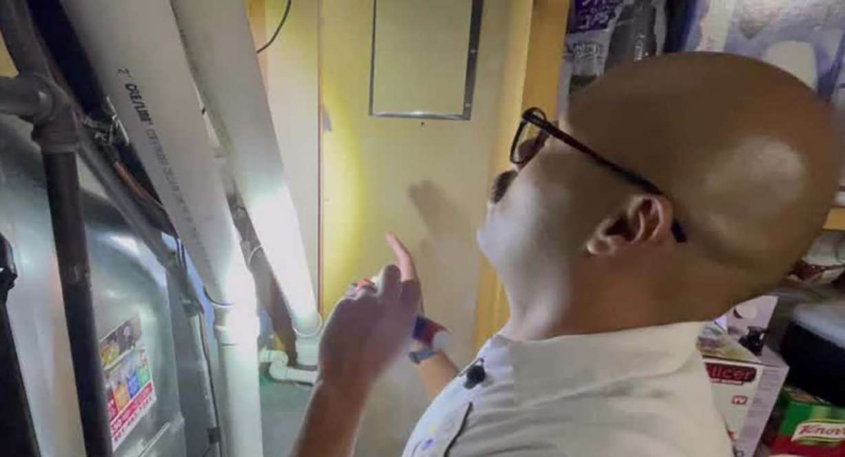 Technician Bryan Tello of Any Hour Services checks an air conditioning unit on Thursday in Salt Lake City. If you haven't maintained your AC you're already behind the curve, but there's still time, experts say.