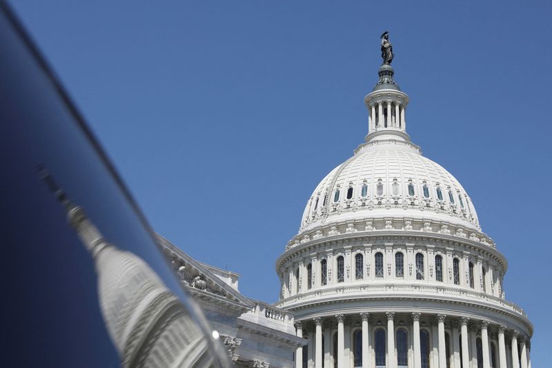 The dome of the U.S. Capitol is reflected in a window on  Capitol Hill in Washington, U.S., April 20.