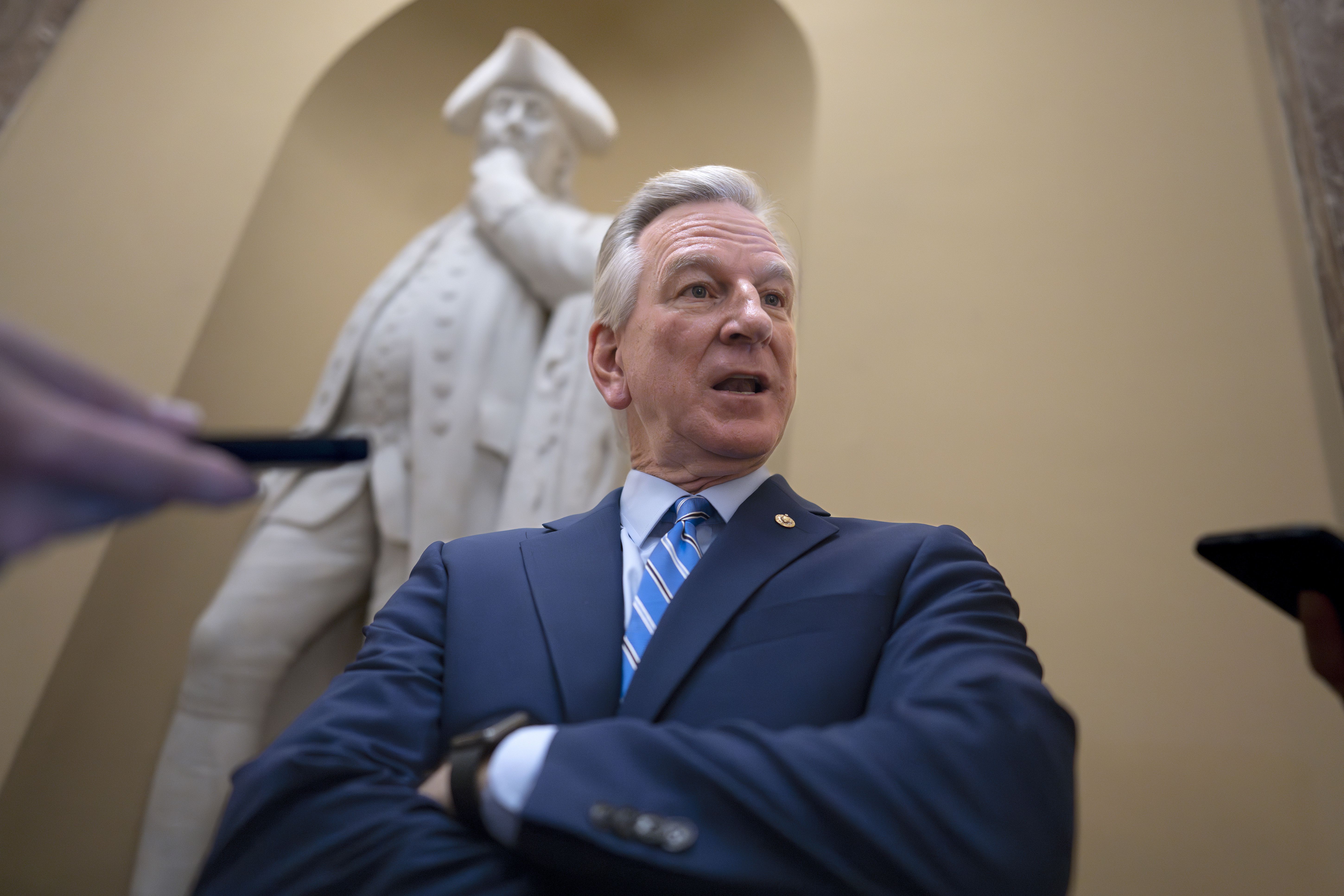 Sen. Tommy Tuberville, R-Ala., a member of the Senate Armed Services Committee, talks to reporters at the Capitol in Washington, May 16.