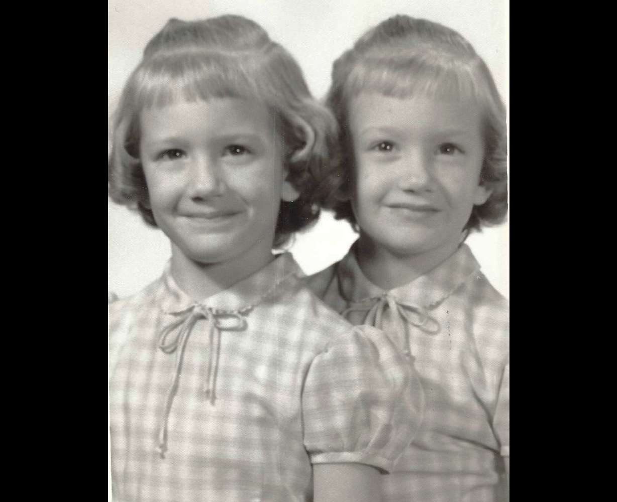 Twin sisters Carla (left) and Charla Haley, both 5, pose for a photo in 1961 in Ashland, Kansas. At age 58, Carla died in 2015 after a battle with lung cancer. Eight years later, Charla Haley continues to grieve the loss of her twin.