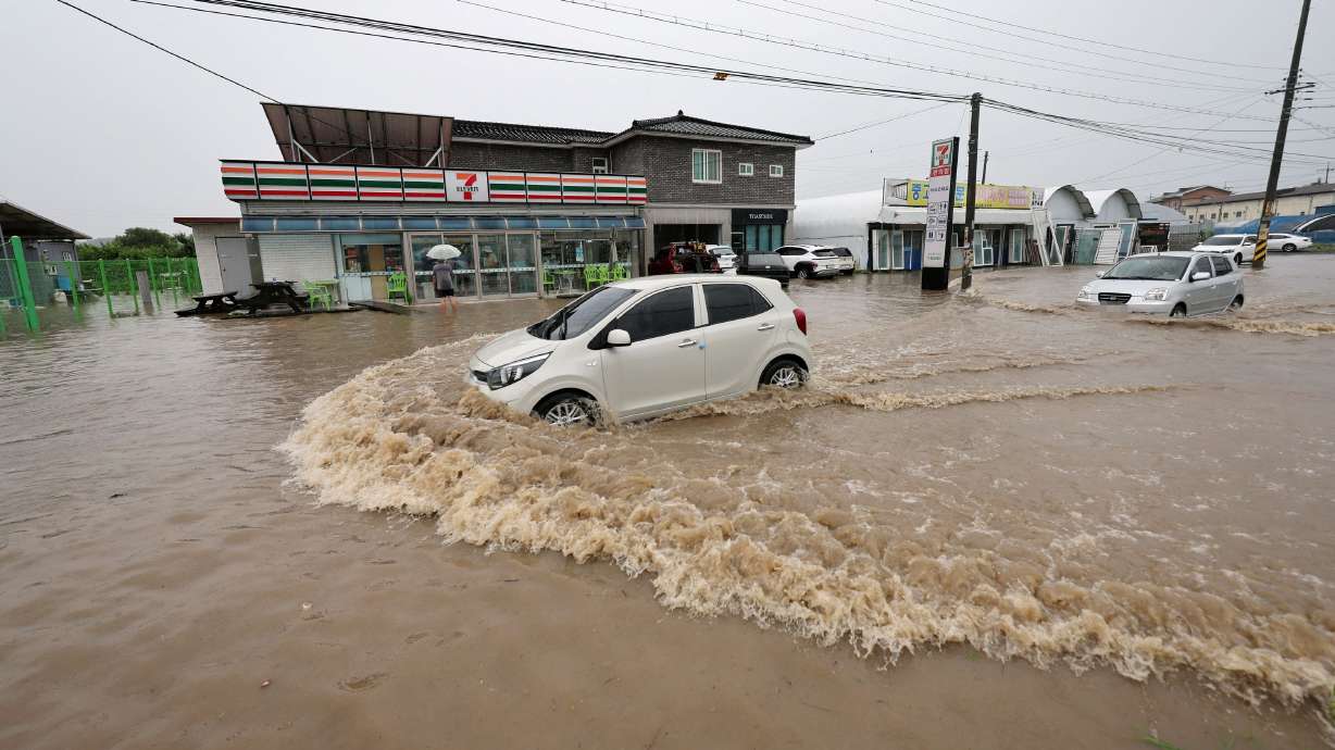 More than 26 people are dead and thousands evacuated in South Korea due to heavy rain in Cheongju, South Korea, on Saturday.