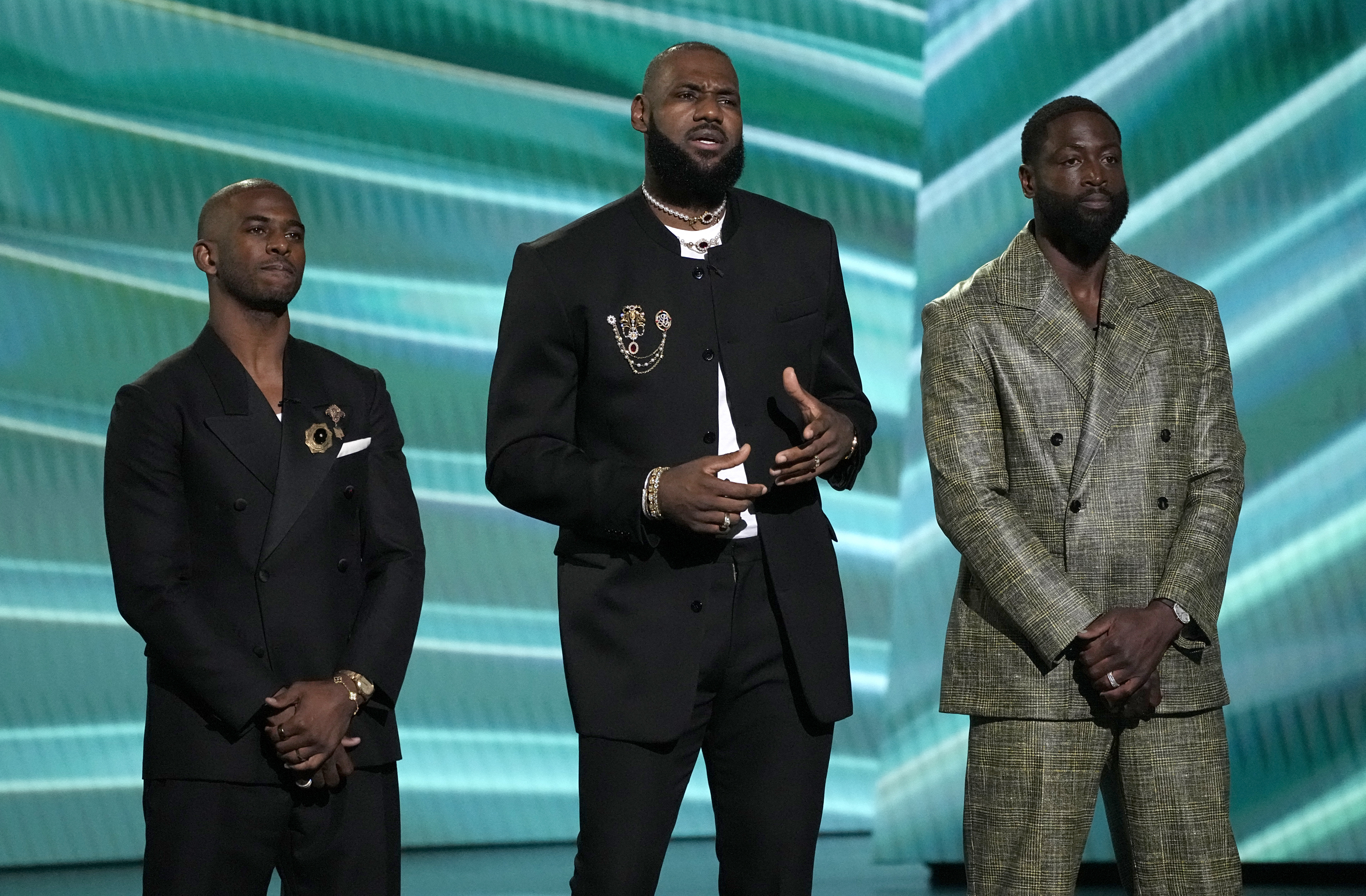 Chris Paul, from left, LeBron James, and Dwyane Wade do a tribute to Carmelo Anthony at the ESPY awards on Wednesday, July 12, 2023, at the Dolby Theatre in Los Angeles. 