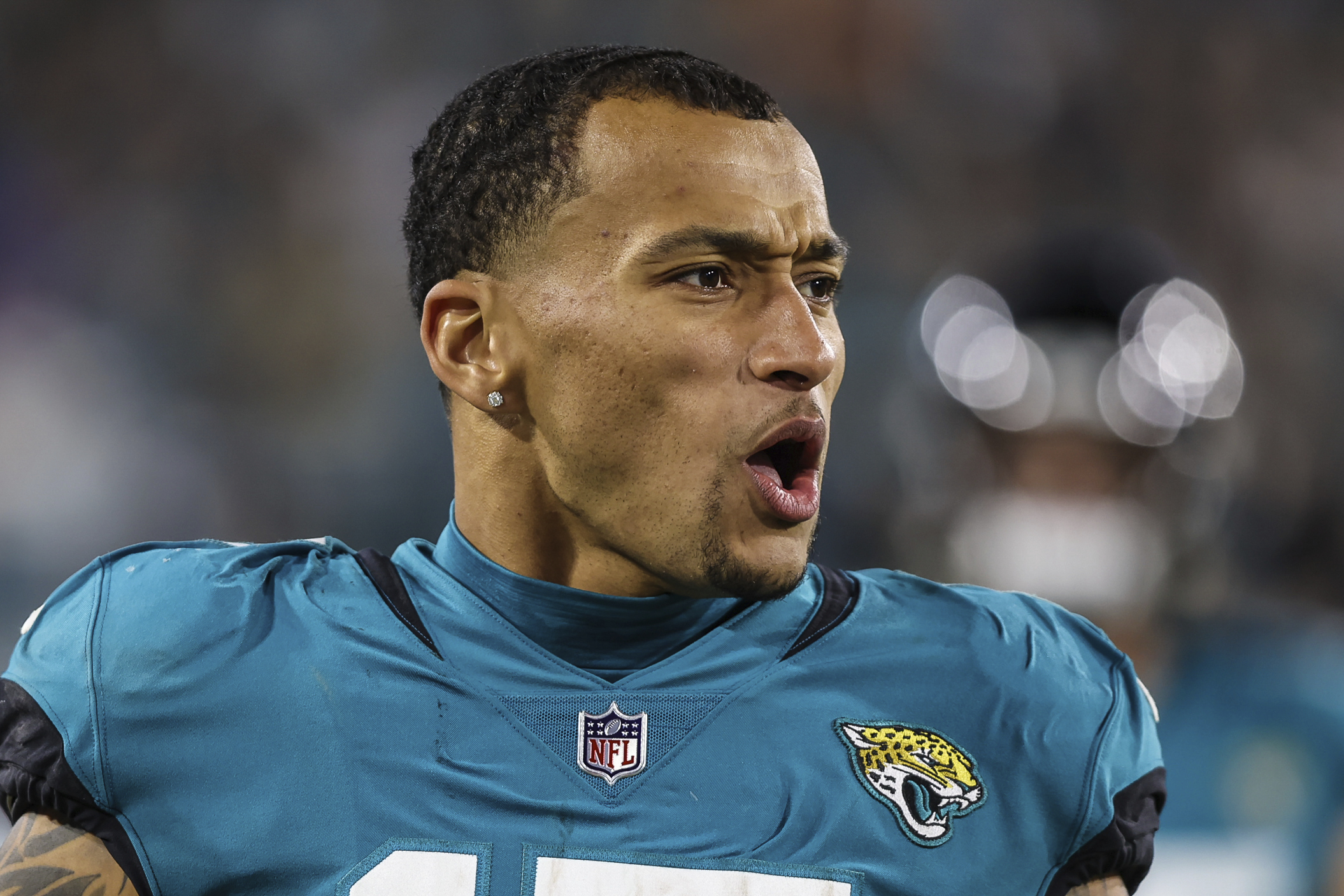 Jacksonville Jaguars tight end Evan Engram walks the sideline during an NFL football game against the Tennessee Titans, Jan. 7, 2023, in Jacksonville, Fla. Engram and the Jaguars agreed Sunday, July 16, 2023 to a three-year, $41.25 million contract that includes $24 million guaranteed, according to a person familiar with negotiations. 