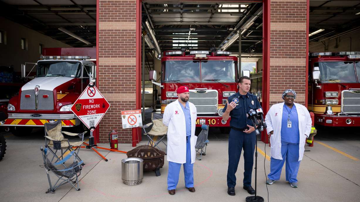 Salt Lake City Fire Capt. Shaun Mumedy is flanked by Dr. Christopher LaChapelle and Dr. Giavanni Lewis, right, at a press conference about heat and fire safety at Fire Station 10 in Salt Lake City on Monday.