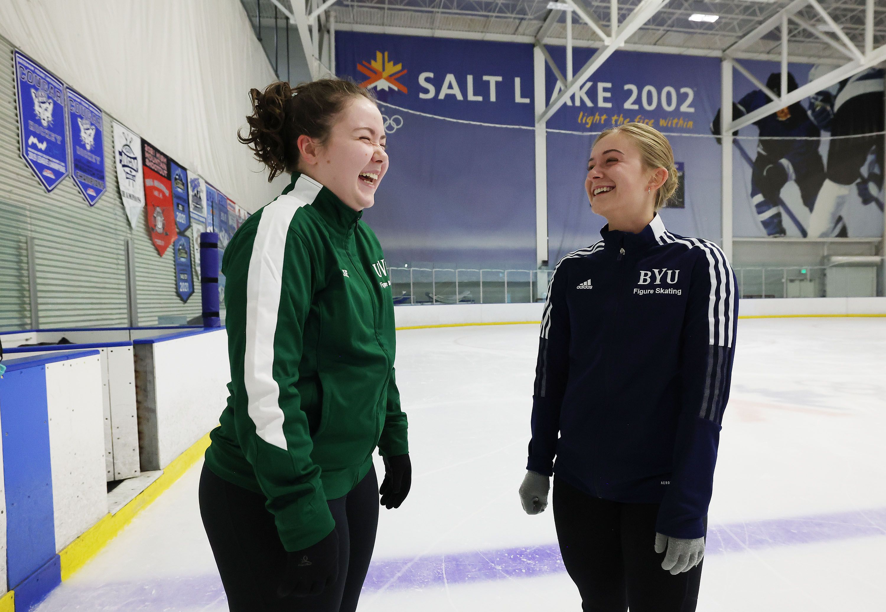 Skaters Kylie Pattberg, who attends UVU, and Lauren Spilker, who attends BYU, laugh while practicing at Seven Peaks Ice Arena in Provo on July 14. They are preparing for the national collegiate figure skating championships.