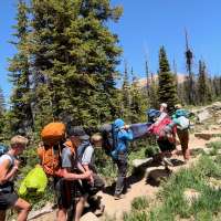 Utah teen hikers rescue dog, carry him to safety