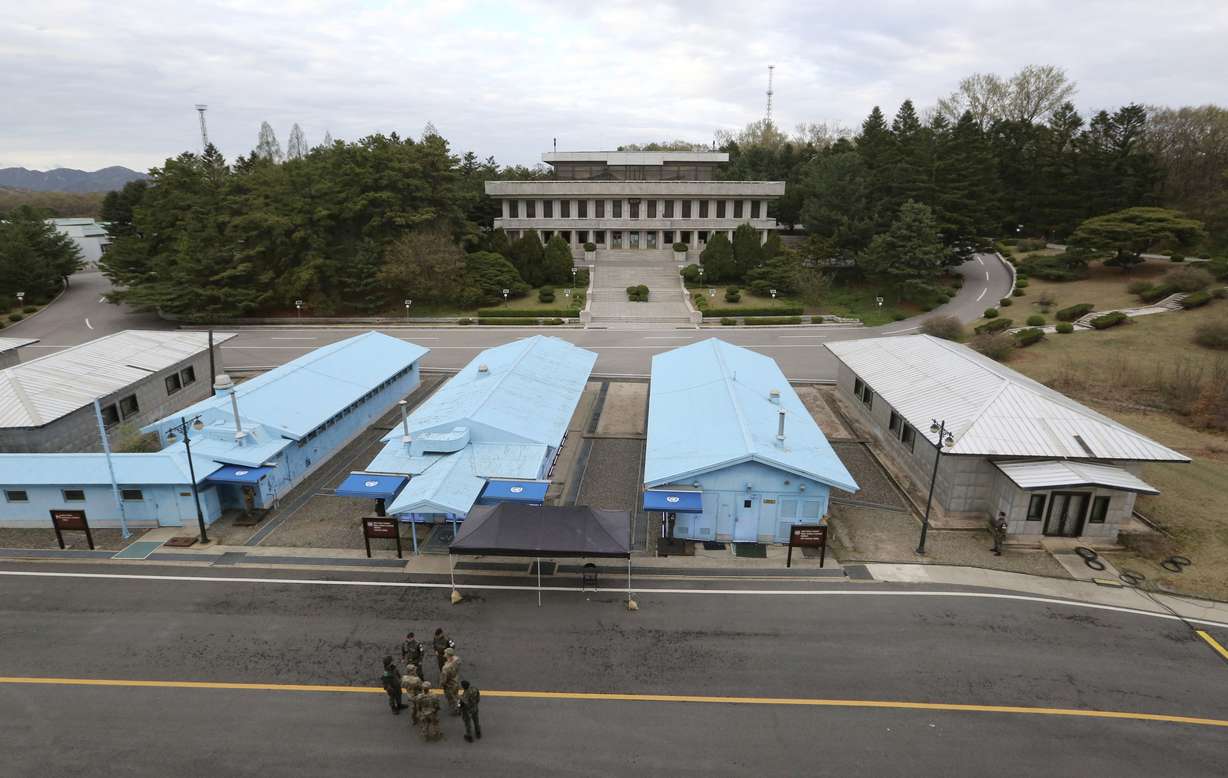 South Korean and U.S. Army soldiers, wearing gray uniforms, gather during a rehearsal to mark the first anniversary of a summit between South Korean President Moon Jae-in and North Korean leader Kim Jong Un, at the border village of Panmunjom in the demilitarized zone between the two Koreas in Paju, South Korea, on April 26, 2019.