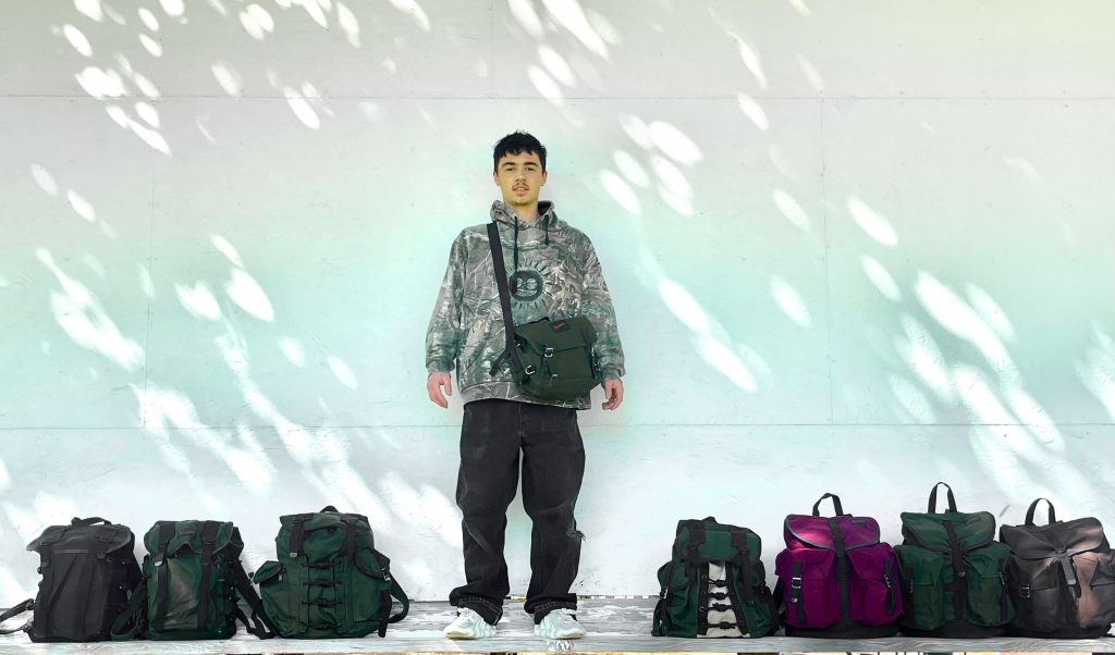 Terrasoma Life owner Jaxon Graham, of Ivins, stands with his backpacks, location and date unspecified.