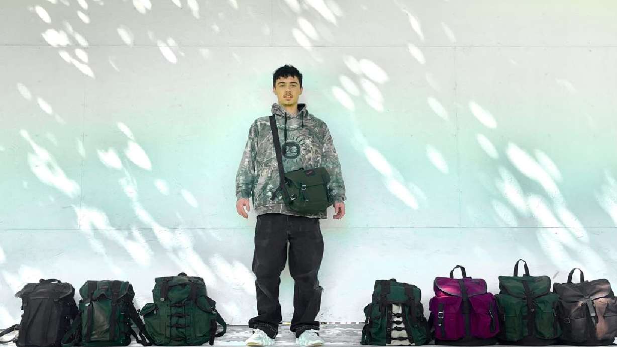 Terrasoma Life owner Jaxon Graham, of Ivins, stands with his backpacks, location and date unspecified.