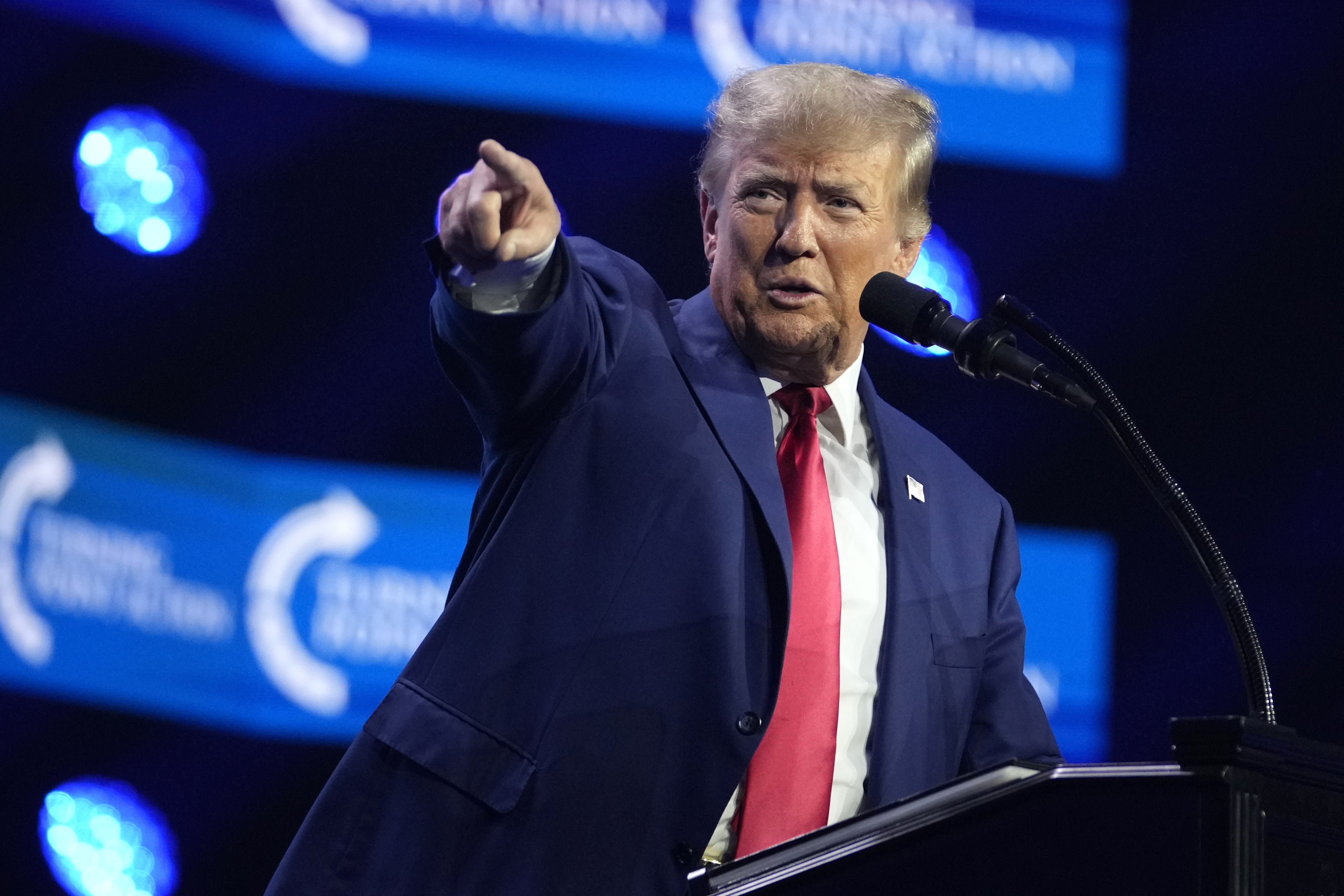 Former President Donald Trump speaks at the Turning Point Action conference, July 15, in West Palm Beach, Fla. He said Tuesday that he has received a letter informing him that he is a target of the Justice Department's investigation into efforts to undo the results of the 2020 presidential election.