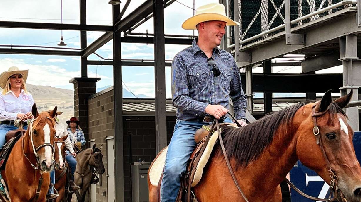 Utah Gov. Spencer Cox joins cowboys and cowgirls in a cattle drive into the Utah Days of '47 Arena in Salt Lake City on Tuesday. Possible extreme heat is in Utah's forecast this weekend.