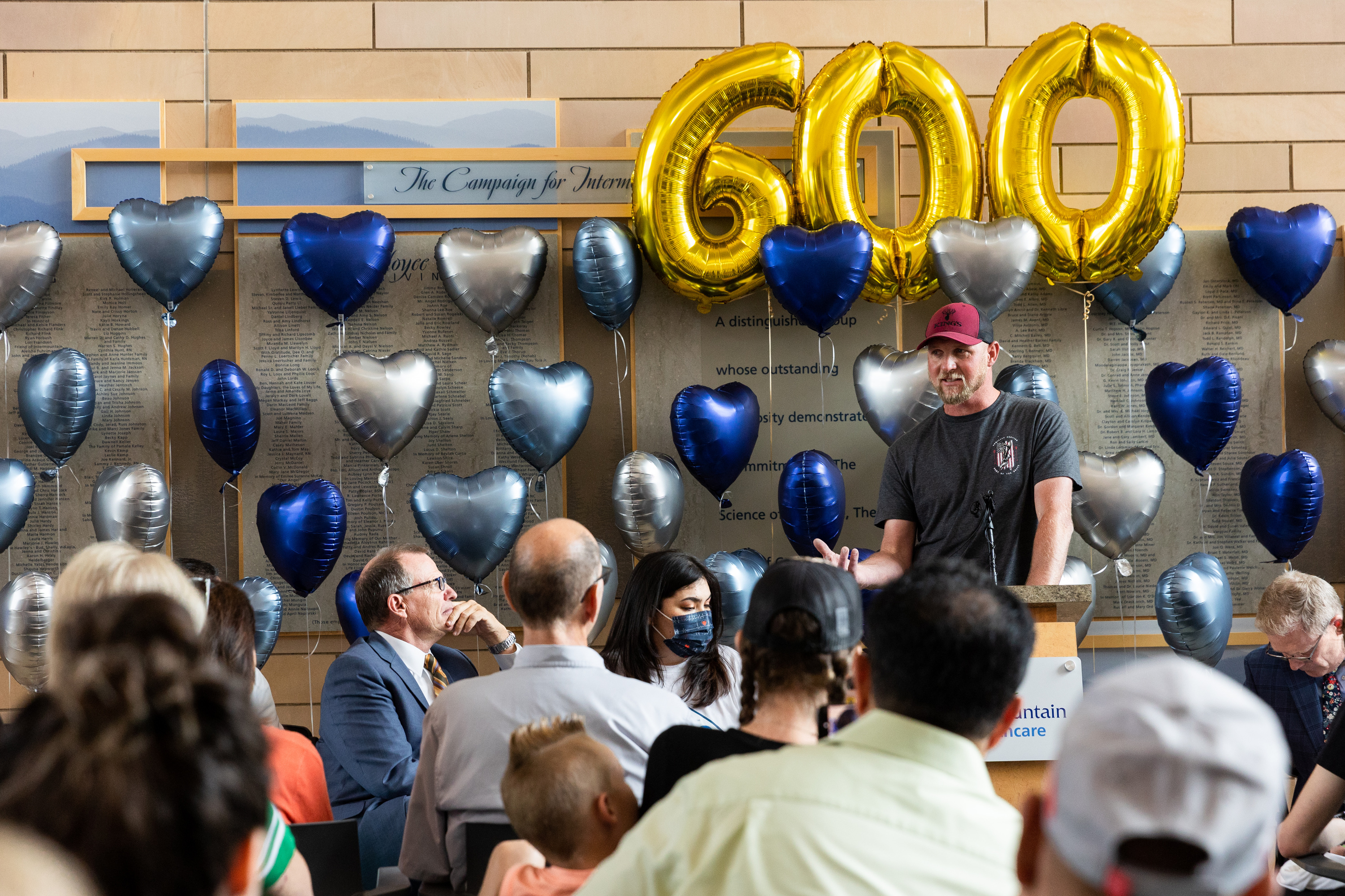 Tyler Larsen, the 605th Intermountain heart transplant recipient, shares his experience at a celebration of the milestone of 600 lifesaving transplants by the Intermountain heart transplant team at the Intermountain Medical Center in Murray on Tuesday.