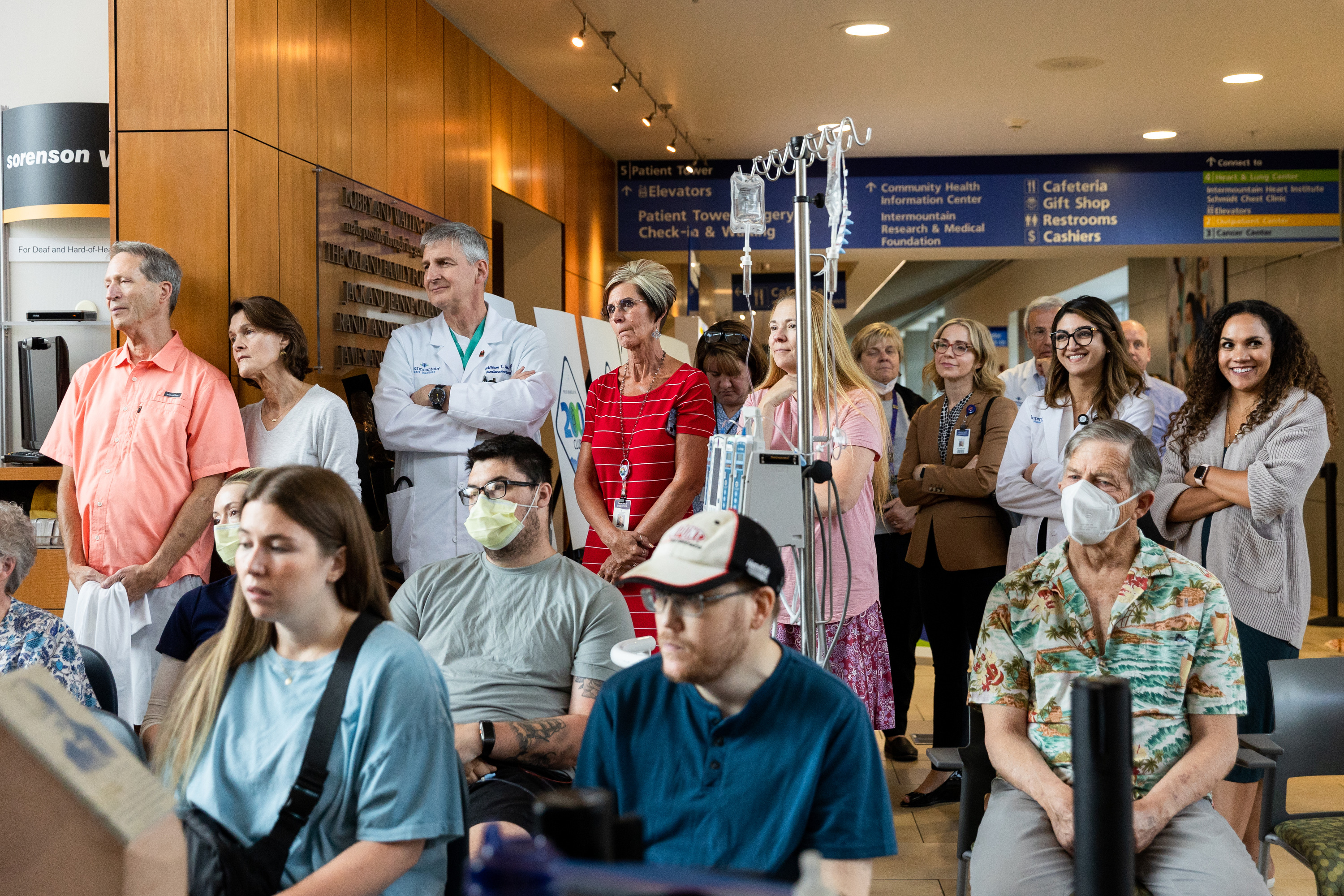 Transplant patients, donor families and caregivers join together to listen to the program at an event held to celebrate the milestone of 600 lifesaving transplants by the Intermountain heart transplant team at the Intermountain Medical Center in Murray on Tuesday.