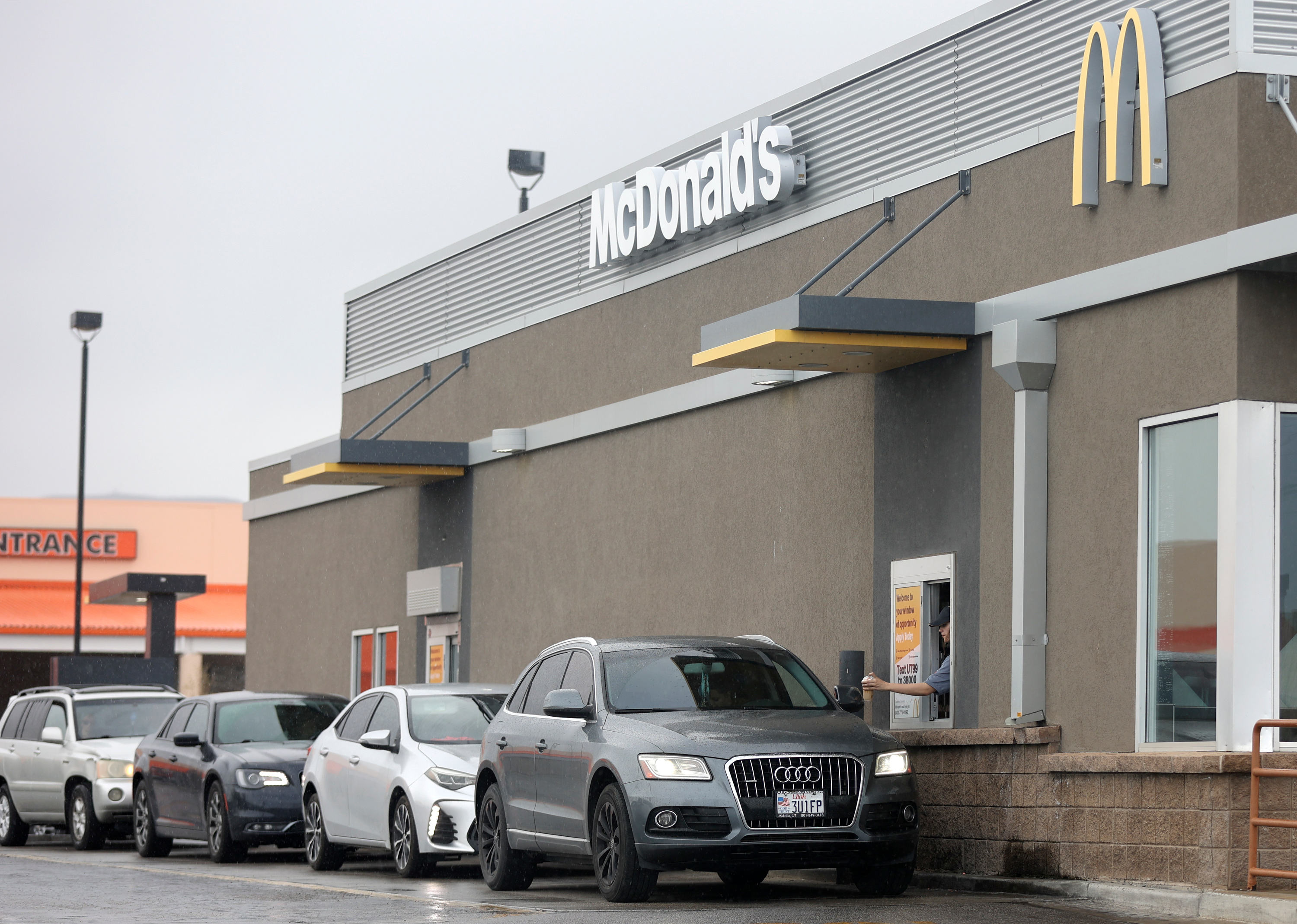 Drivers wait in the drive-thru lane at McDonald’s in Salt Lake City on April 18. Members of the Salt Lake City Council are inching closer to a decision on whether to ban new drive-thru service at the crowded Sugar House Business District.