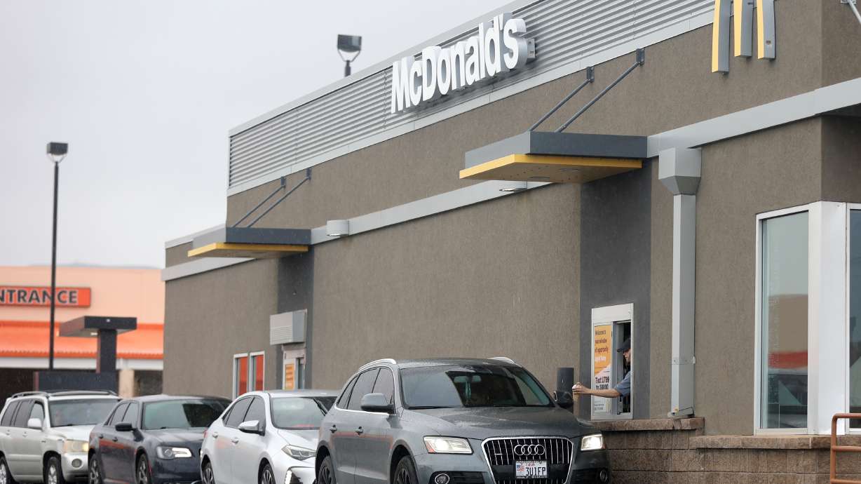 Drivers wait in the drive-thru lane at McDonald’s in Salt Lake City on April 18. Members of the Salt Lake City Council are inching closer to a decision on whether to ban new drive-thru service at the crowded Sugar House Business District.