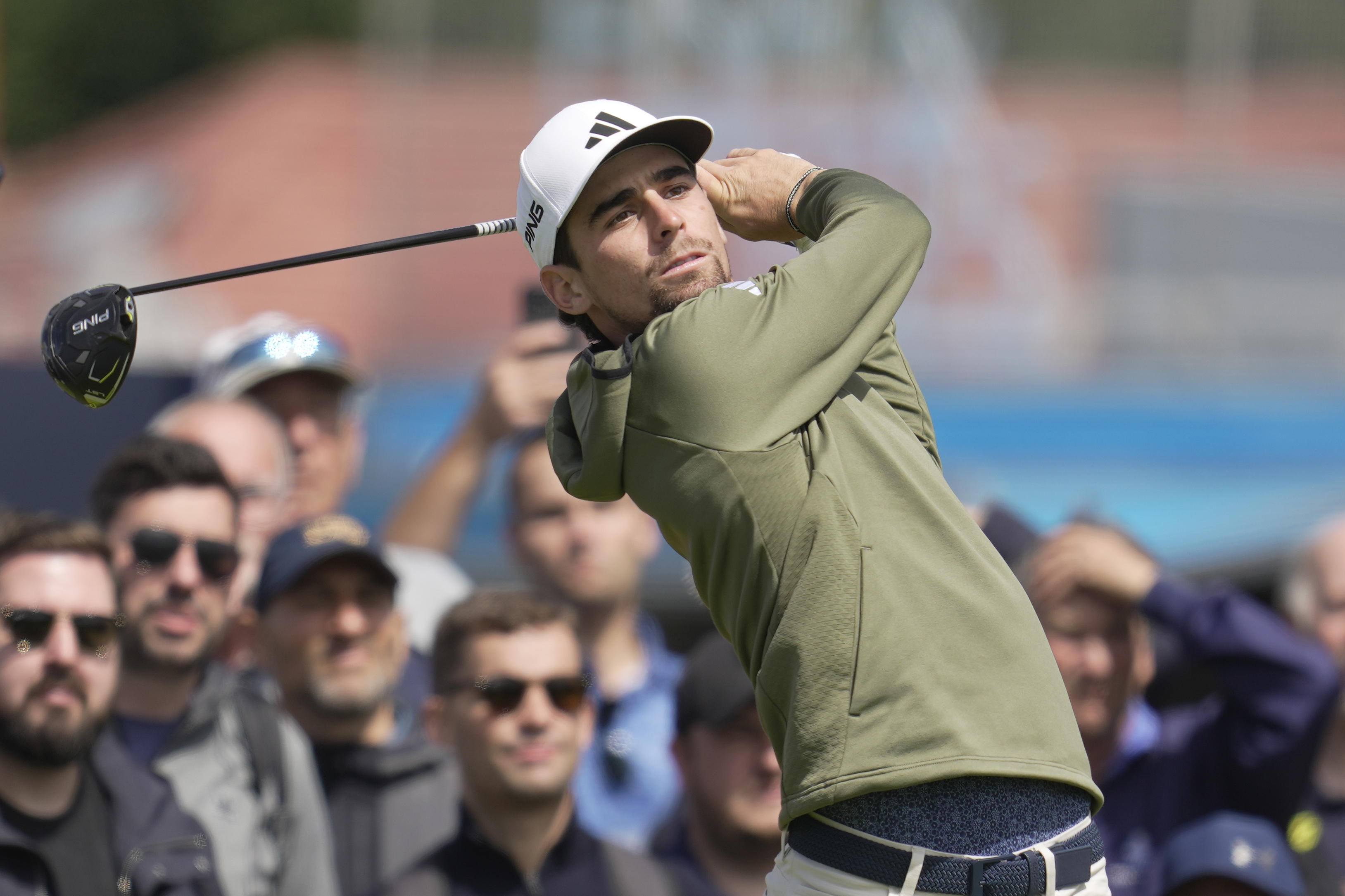 Chile's Joaquin Niemann plays his tee shot on the 12th hole during a practice round for the British Open Golf Championships at the Royal Liverpool Golf Club in Hoylake, England, Wednesday, July 19, 2023. The Open starts Thursday, July 20. 