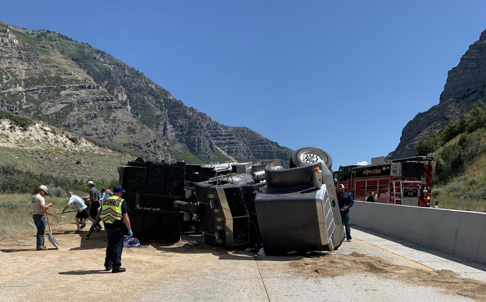 Westbound U.S. 189 was closed Wednesday after a dump truck carrying dirt crashed and spilled.