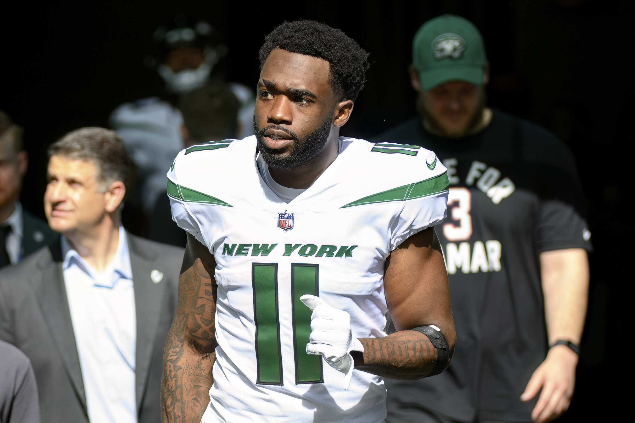 FILE - New York Jets wide receiver Denzel Mims (11) walks onto the field before an NFL football game against the Miami Dolphins, Sunday, Jan. 8, 2023, in Miami Gardens, Fla. The New York Jets will release wide receiver Denzel Mims if they don't find a trade partner for the disappointing 2020 second-round draft pick, two people with knowledge of the situation said Wednesday, July 19. 