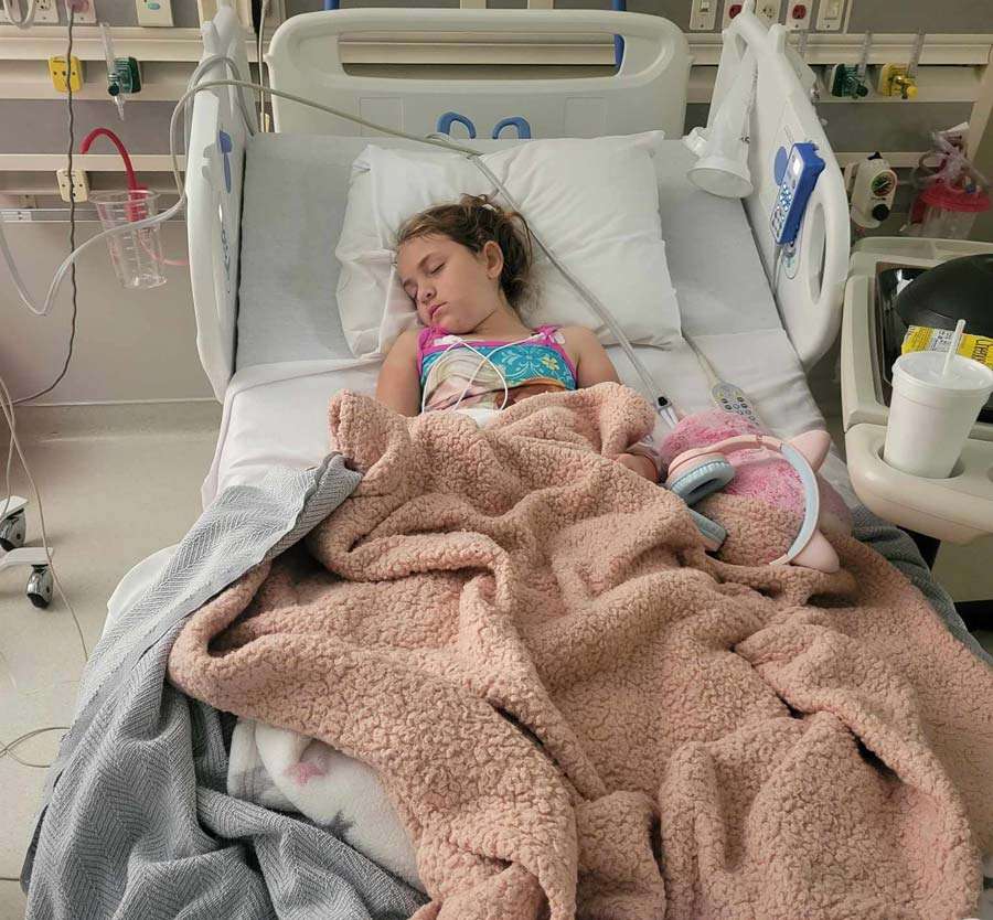 Tasia Noyes is seen at the hospital. She is recovering at home after she was bitten by a rattlesnake while swimming.