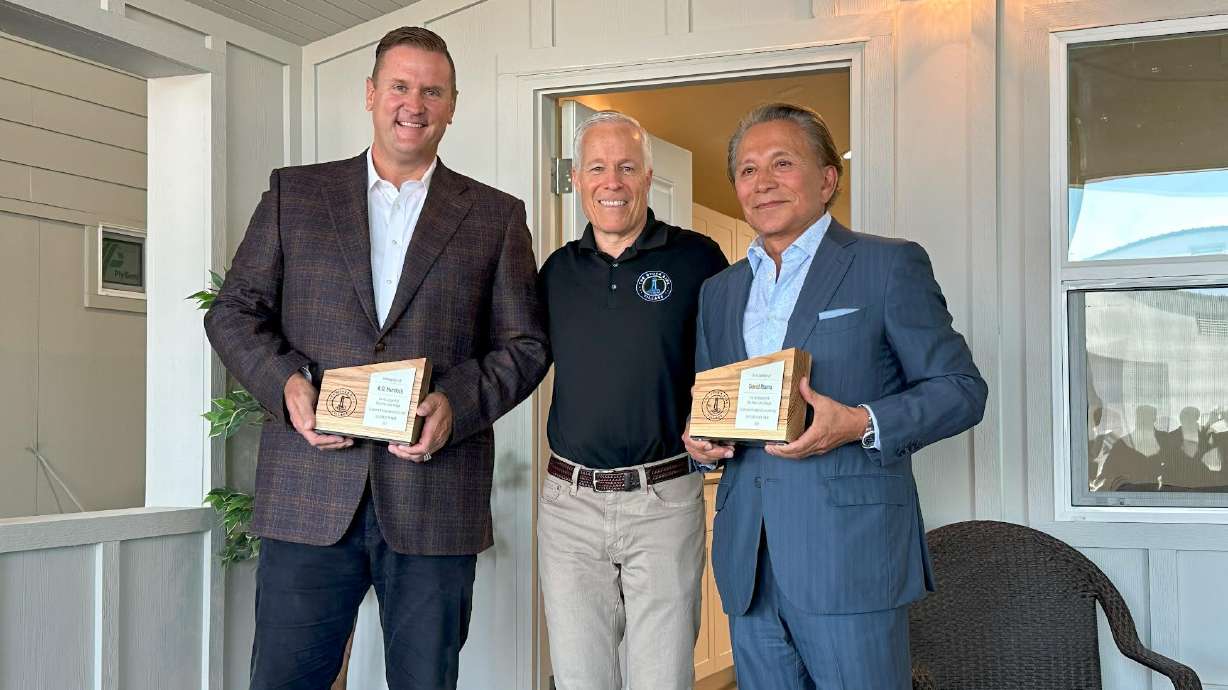 Business leaders David Ibarra and Tyson Murdock unveiled sponsored homes “Live Ready Casa” and “Silverado Manor” for the Other Side Village on Wednesday. The tiny-home village will serve the chronically homeless.