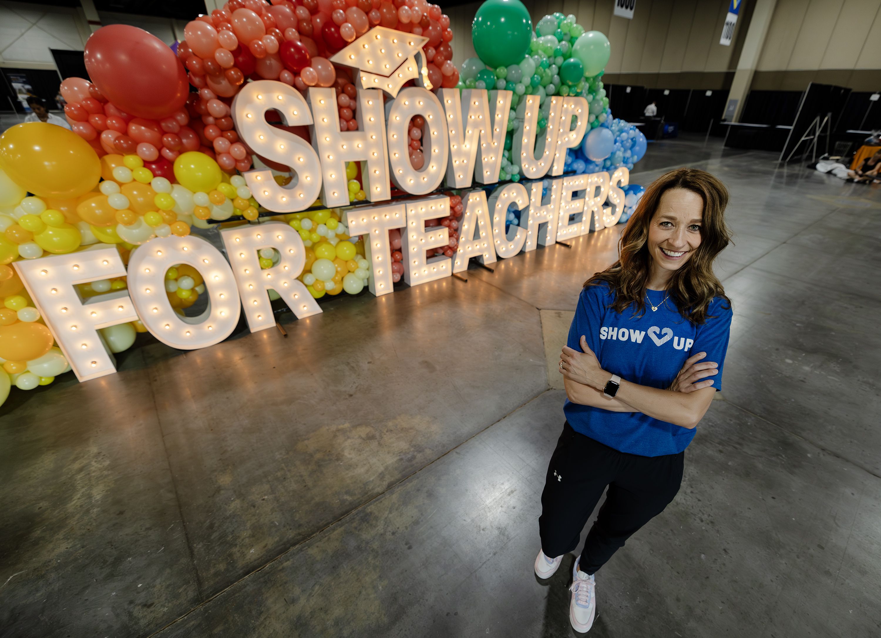Utah first lady Abby Cox poses for a photo as she and her team get ready for the Show Up for Teachers event, at the Mountain America Exhibition Center in Sandy on Tuesday.