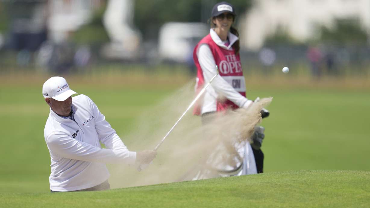 United States Stewart Cink plays out of a bunker on the 18th green on the first day of the British Open Golf Championships at the Royal Liverpool Golf Club in Hoylake, England, Thursday, July 20, 2023.