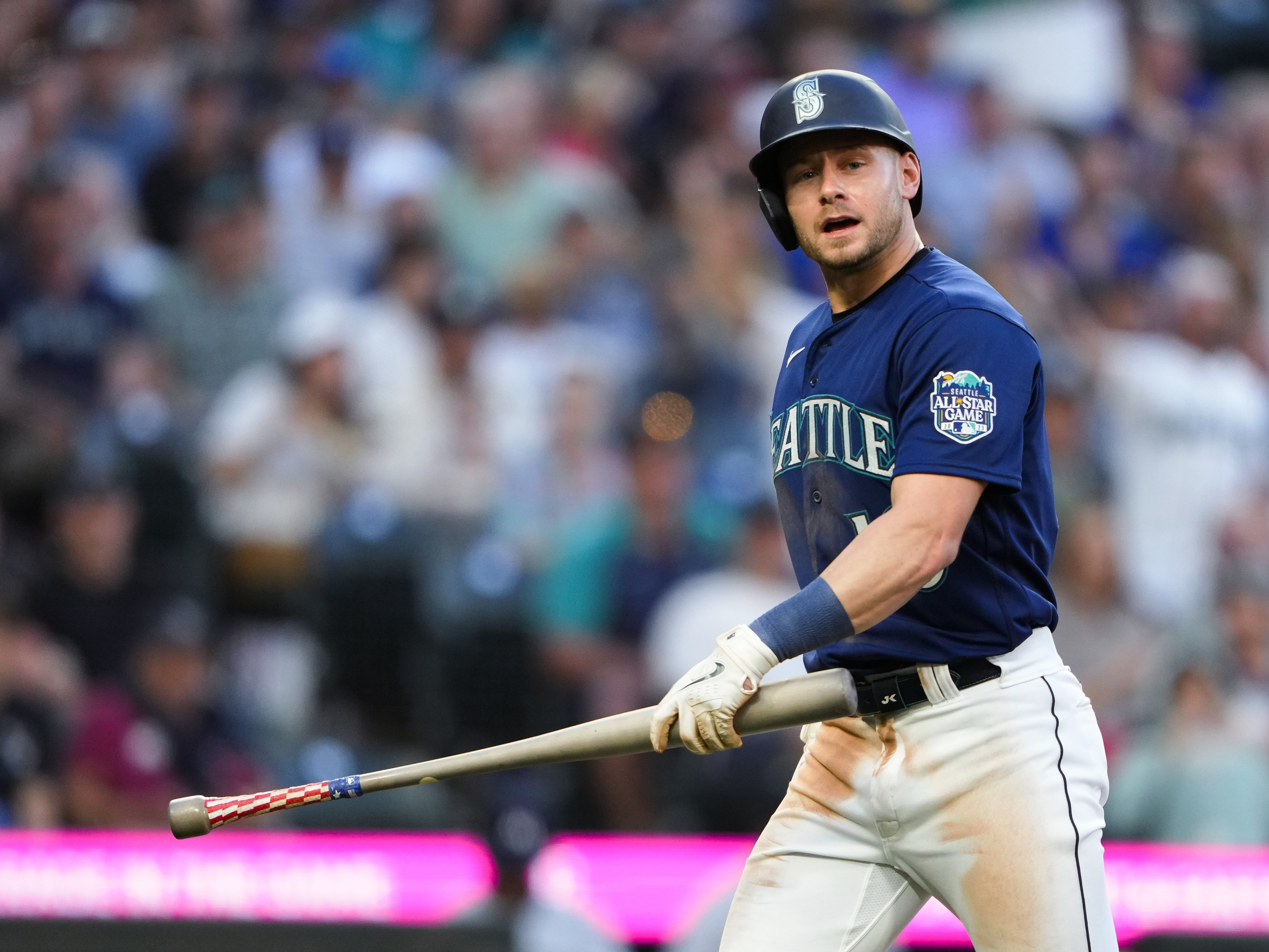 Seattle Mariners' Jarred Kelenic reacts after grounding out against the Minnesota Twins during the fifth inning of a baseball game Tuesday, July 18, 2023, in Seattle. 