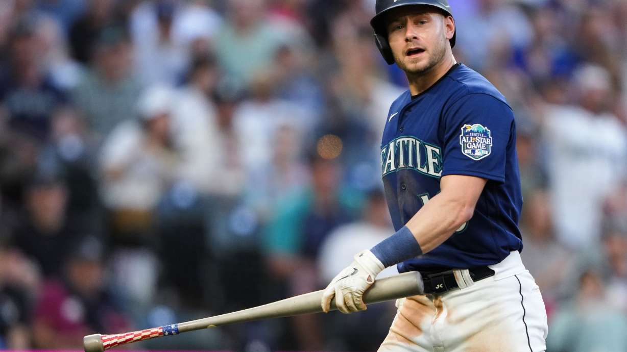 Seattle Mariners' Jarred Kelenic reacts after grounding out against the Minnesota Twins during the fifth inning of a baseball game Tuesday, July 18, 2023, in Seattle.